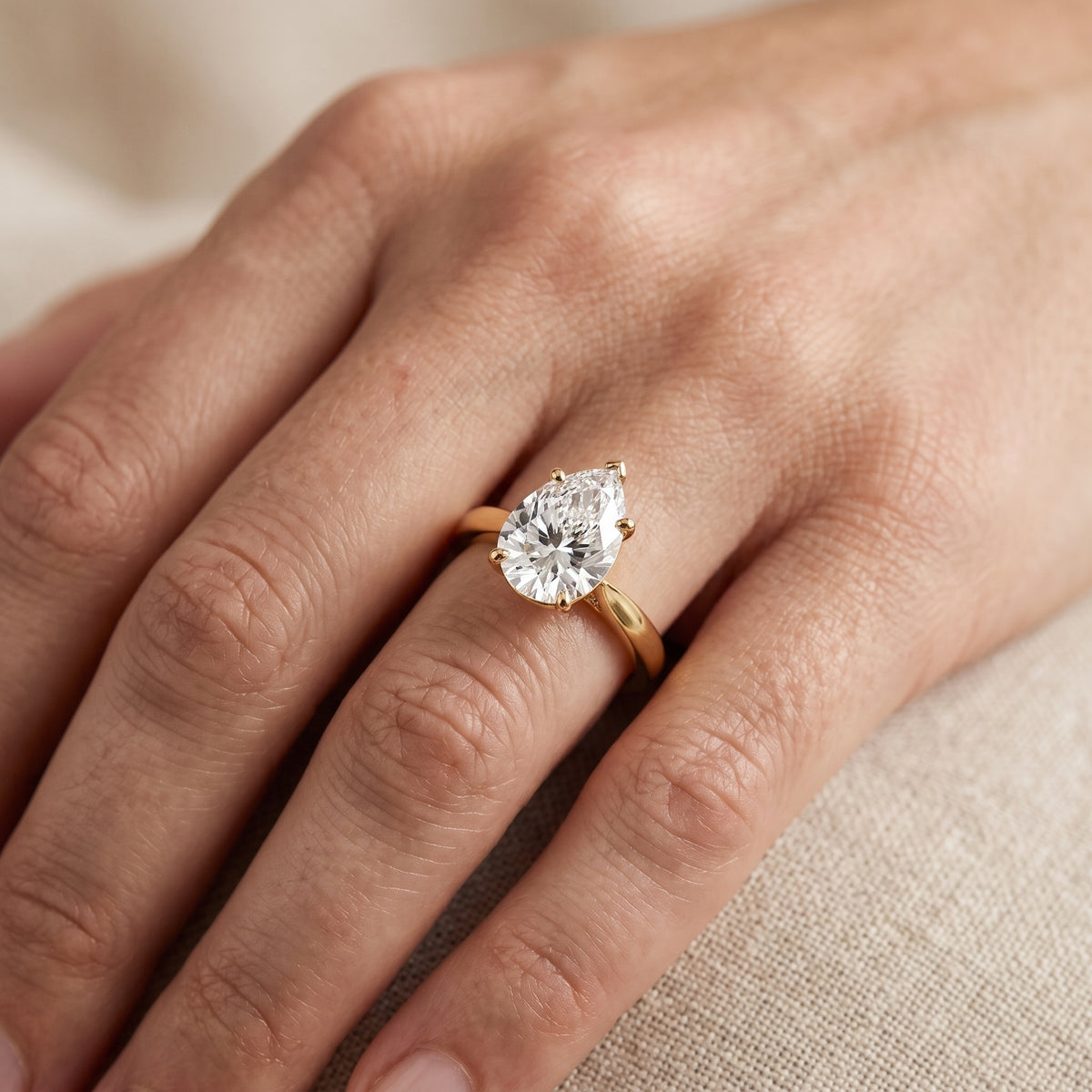 Sofia Cathedral Pear Diamond Engagement Ring in Yellow Gold - lifestyle.jpg