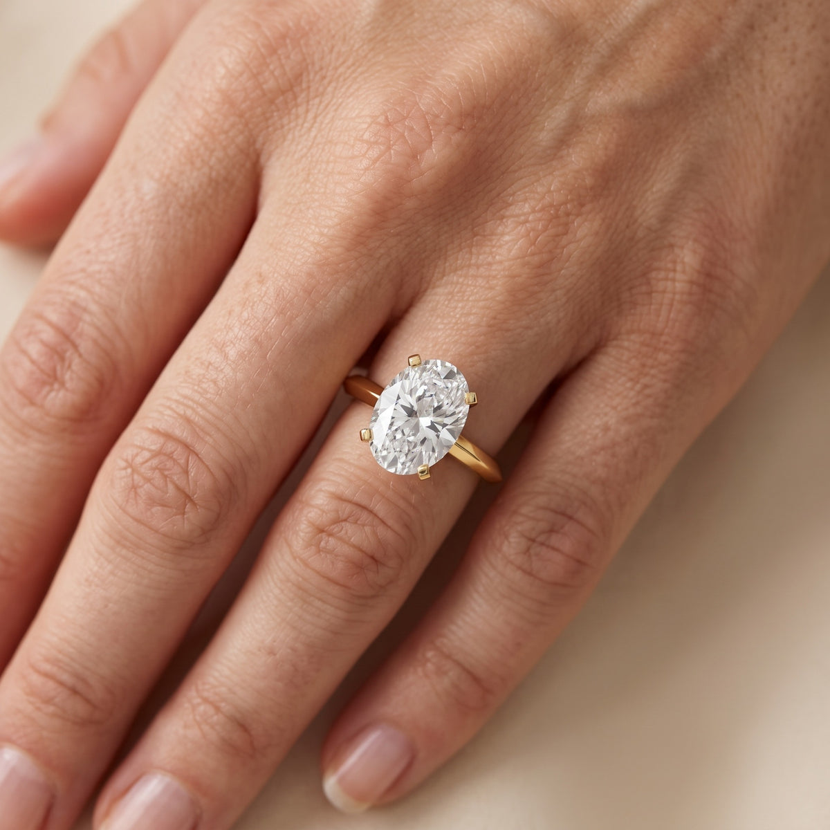Verity Solitaire Knife Edge Oval Diamond Engagement Ring in Silver - lifestyle.jpg