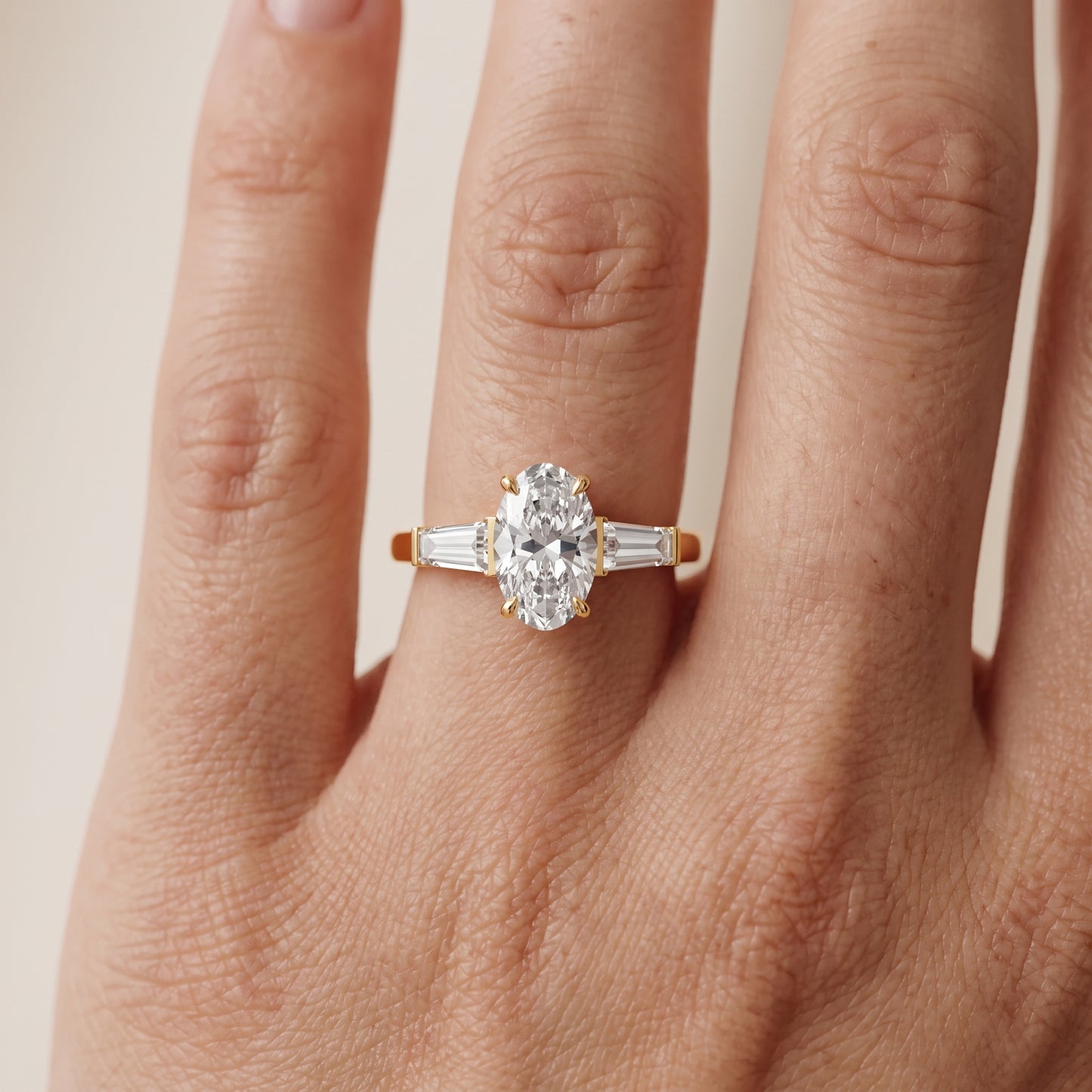 Zelda Tapered Baguette Oval Diamond Engagement Ring in Yellow Gold - lifestyle.jpg