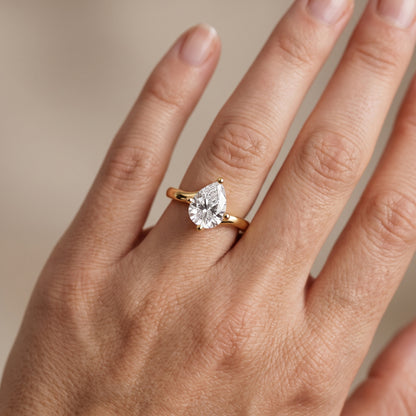 Clio Bypass Solitaire Pear Diamond Engagement Ring in Silver - lifestyle.jpg