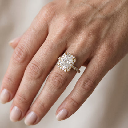 Amara Halo Claw Prong Radiant Diamond Engagement Ring in Yellow Gold - lifestyle.jpg