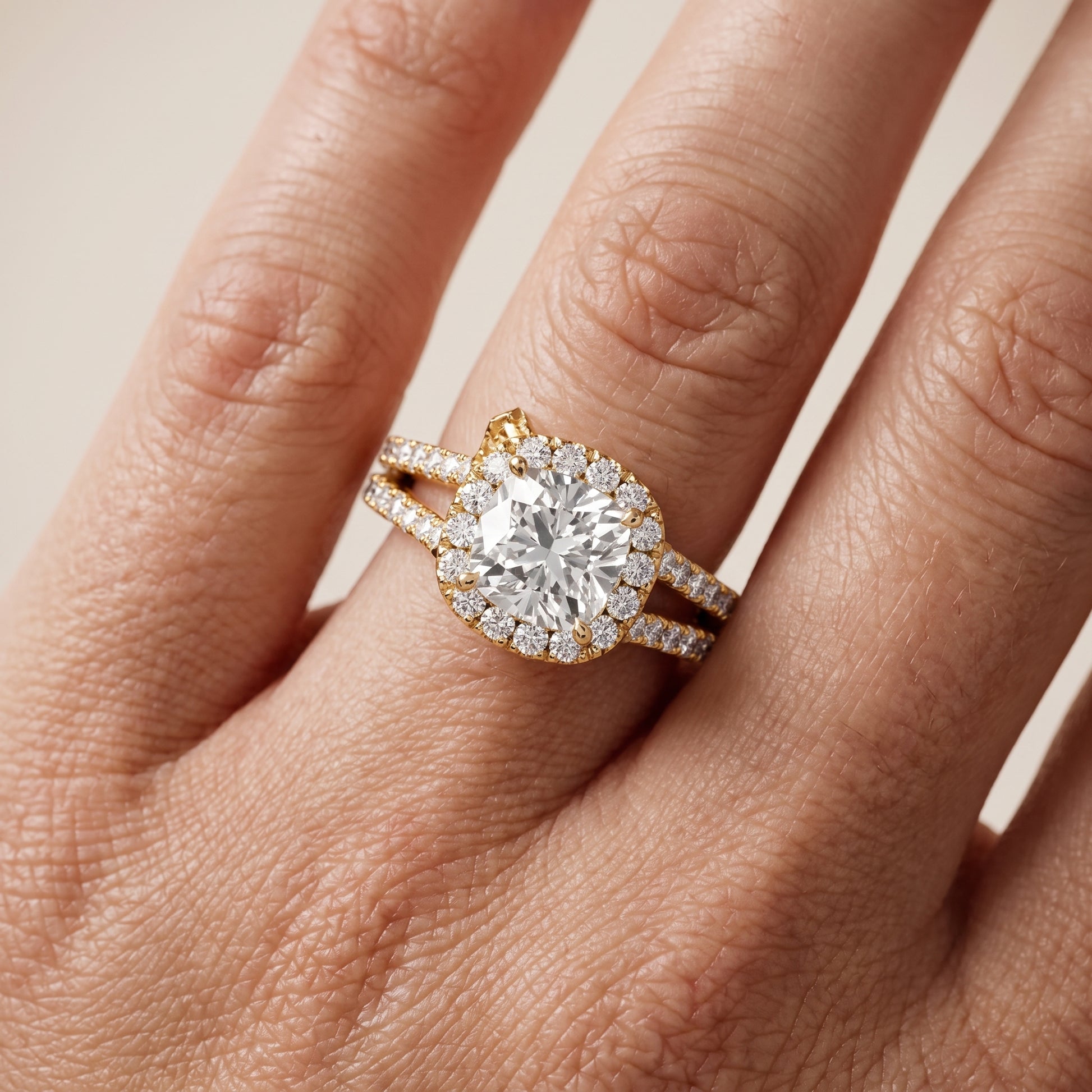 Kira Halo Split Shank Cushion Diamond Engagement Ring in Yellow Gold - lifestyle.jpg