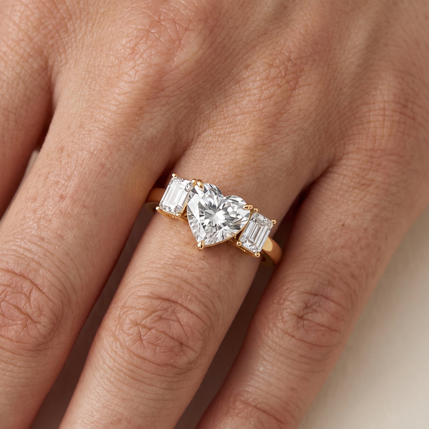 Zoe Three-Stone Heart Diamond Ring in Yellow Gold - lifestyle.jpg