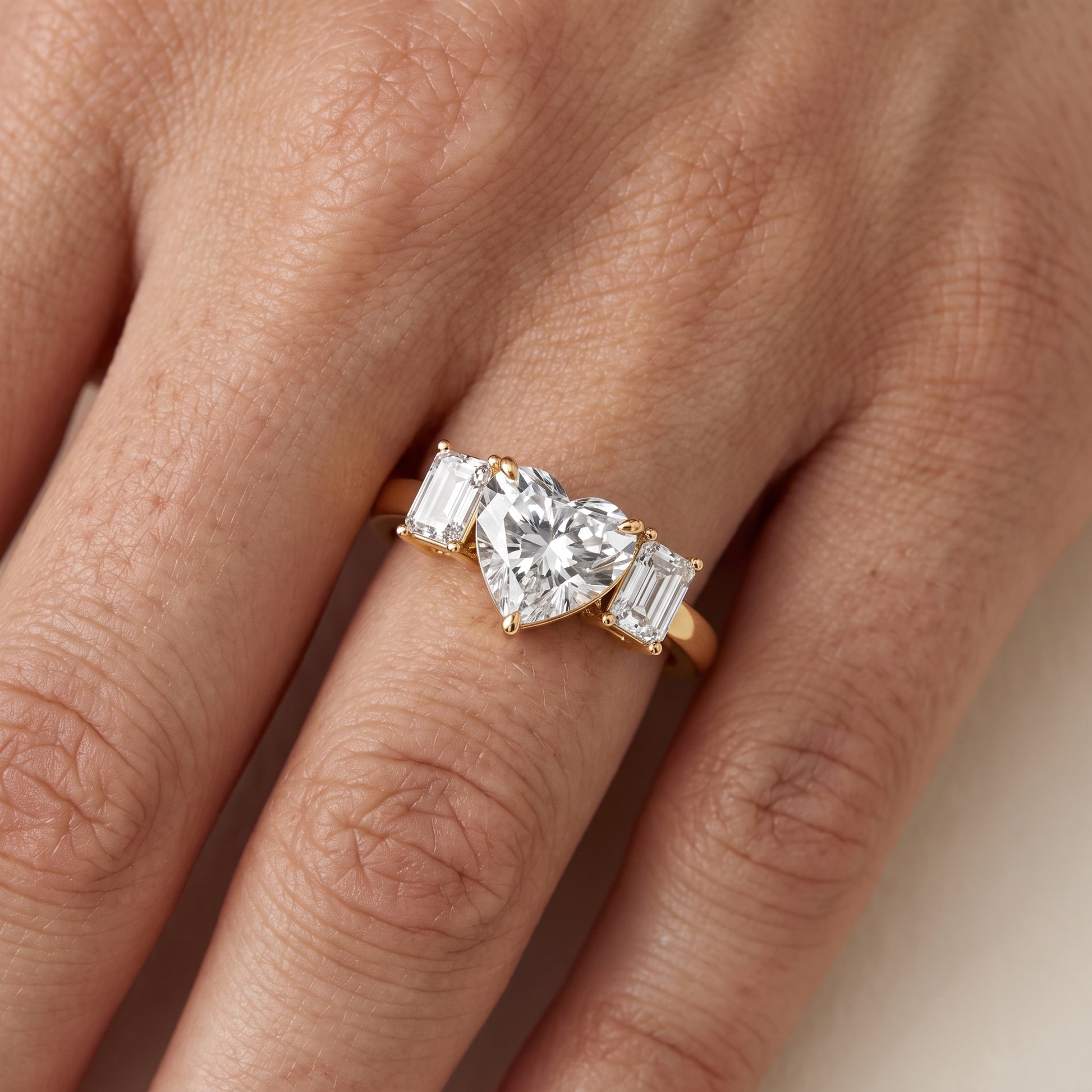 Zoe Three-Stone Heart Diamond Ring in Yellow Gold - lifestyle.jpg