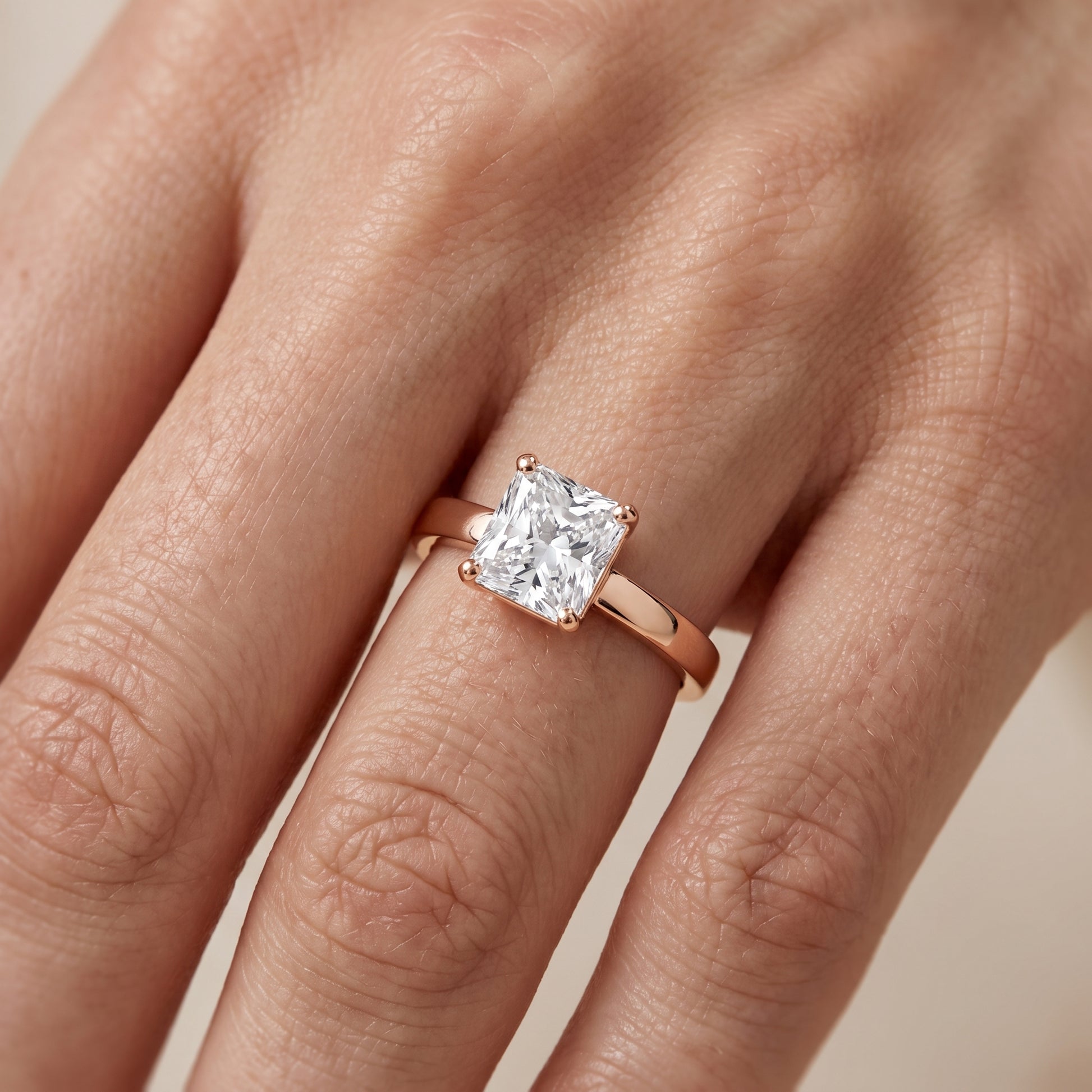 Delia Solitaire Radiant Diamond Engagement Ring in Rose Gold - lifestyle.jpg