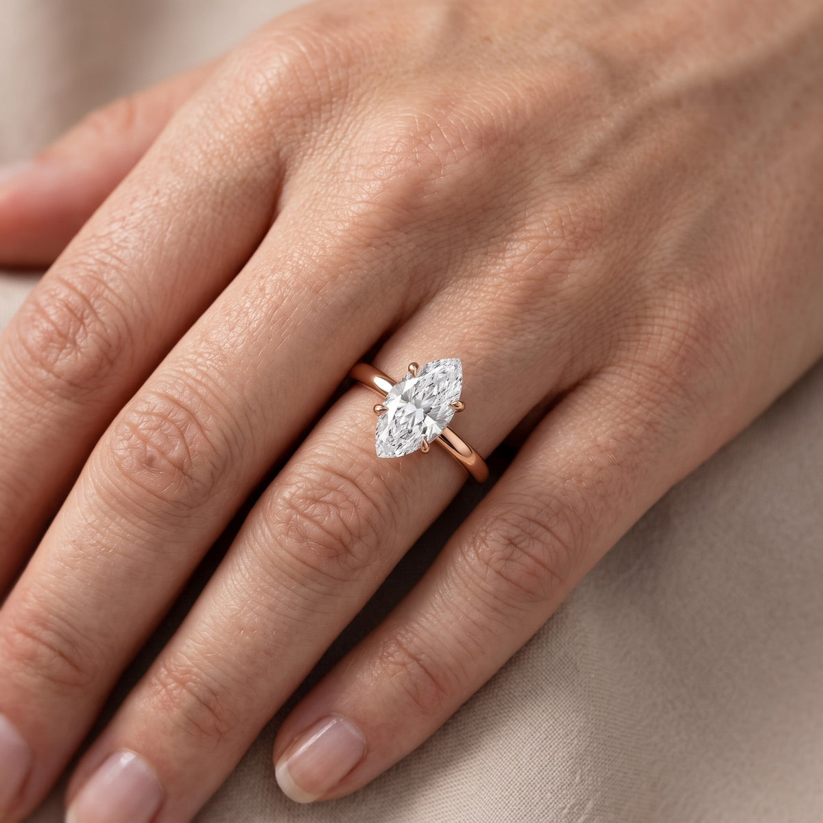 Charlotte Charm Solitaire Marquise Diamond Engagement Ring in Rose Gold - lifestyle.jpg