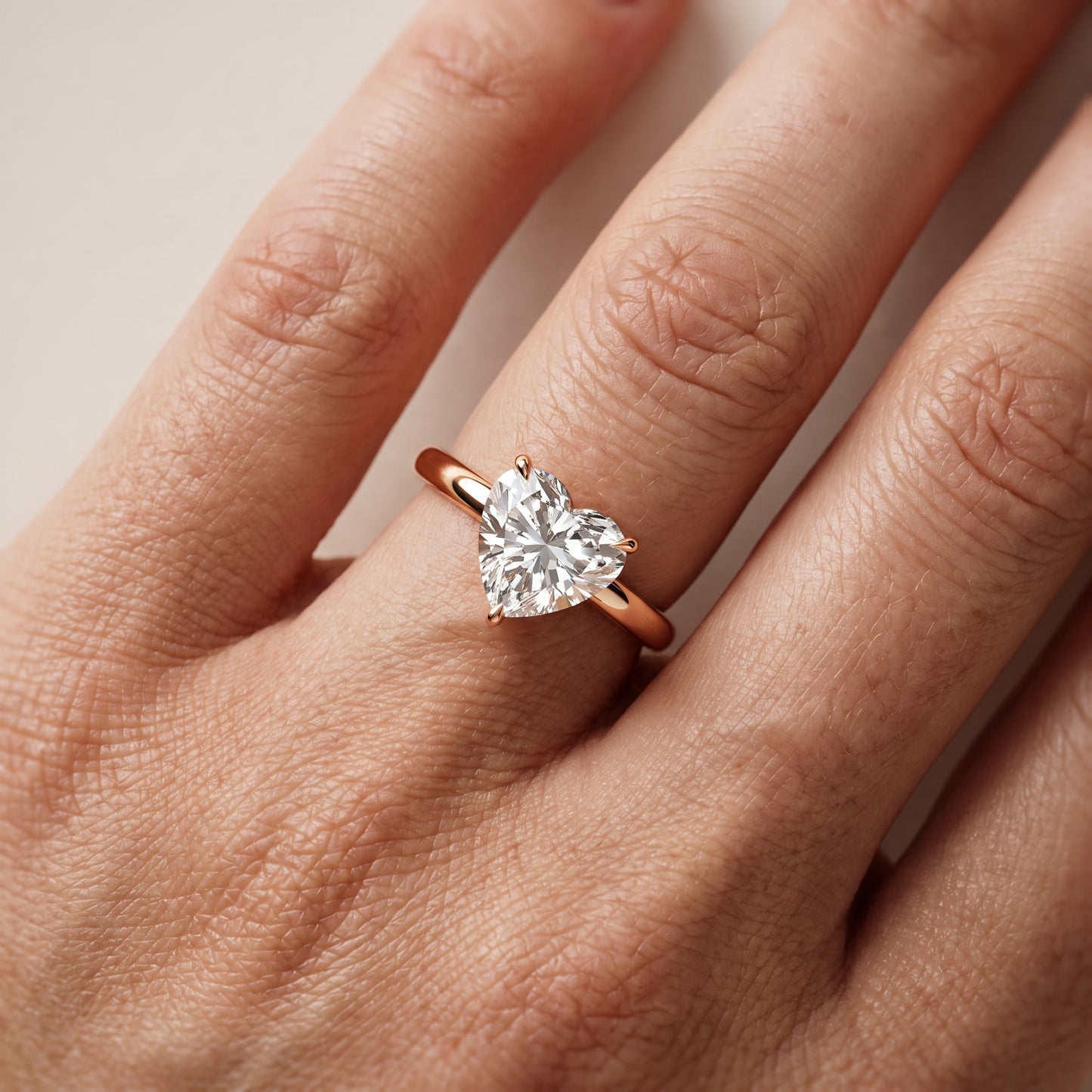 Lyla Petite Solitaire Heart Diamond Engagement Ring in Rose Gold - lifestyle.jpg