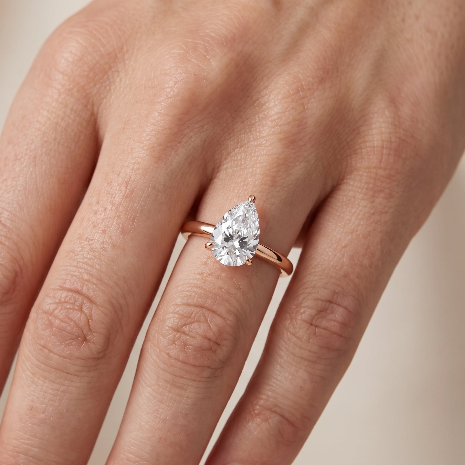 Sadie Cathedral Solitaire Pear Diamond Ring in Rose Gold - lifestyle.jpg