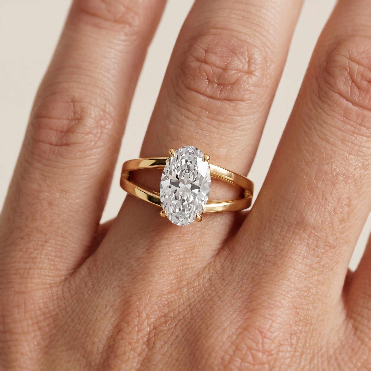 Giselle Solitaire Split Shank Oval Diamond Engagement Ring in Yellow Gold - lifestyle.jpg
