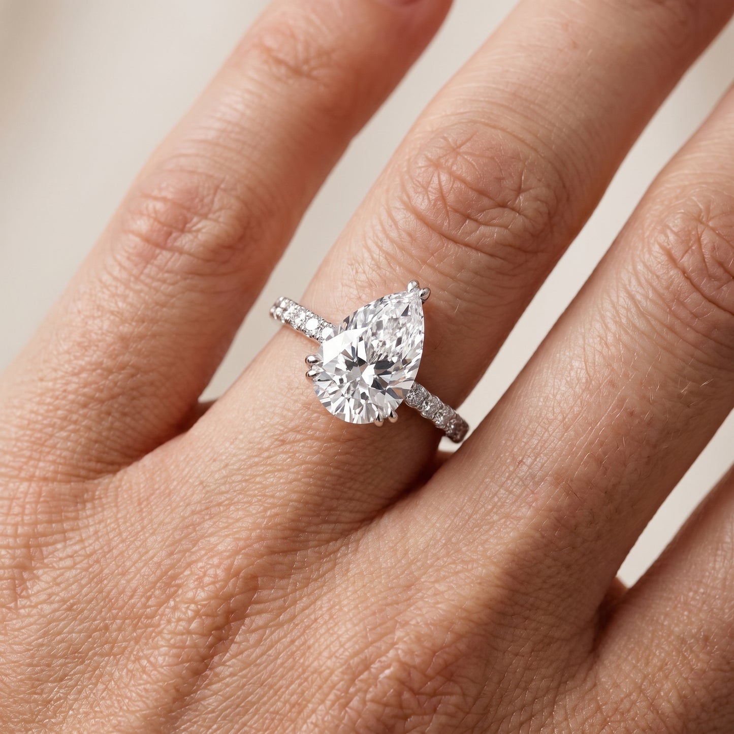 Novara Solitaire Pavé Pear Diamond Ring in Silver - lifestyle.jpg