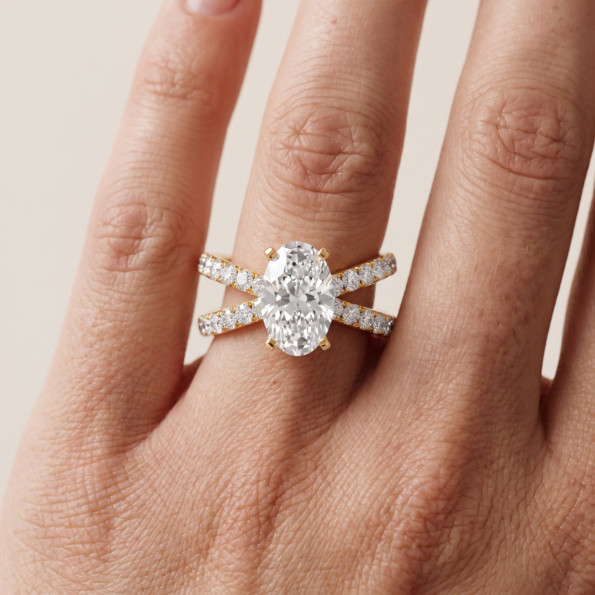Lior Criss Cross Pavé Oval Diamond Engagement Ring in Yellow Gold - lifestyle.jpg