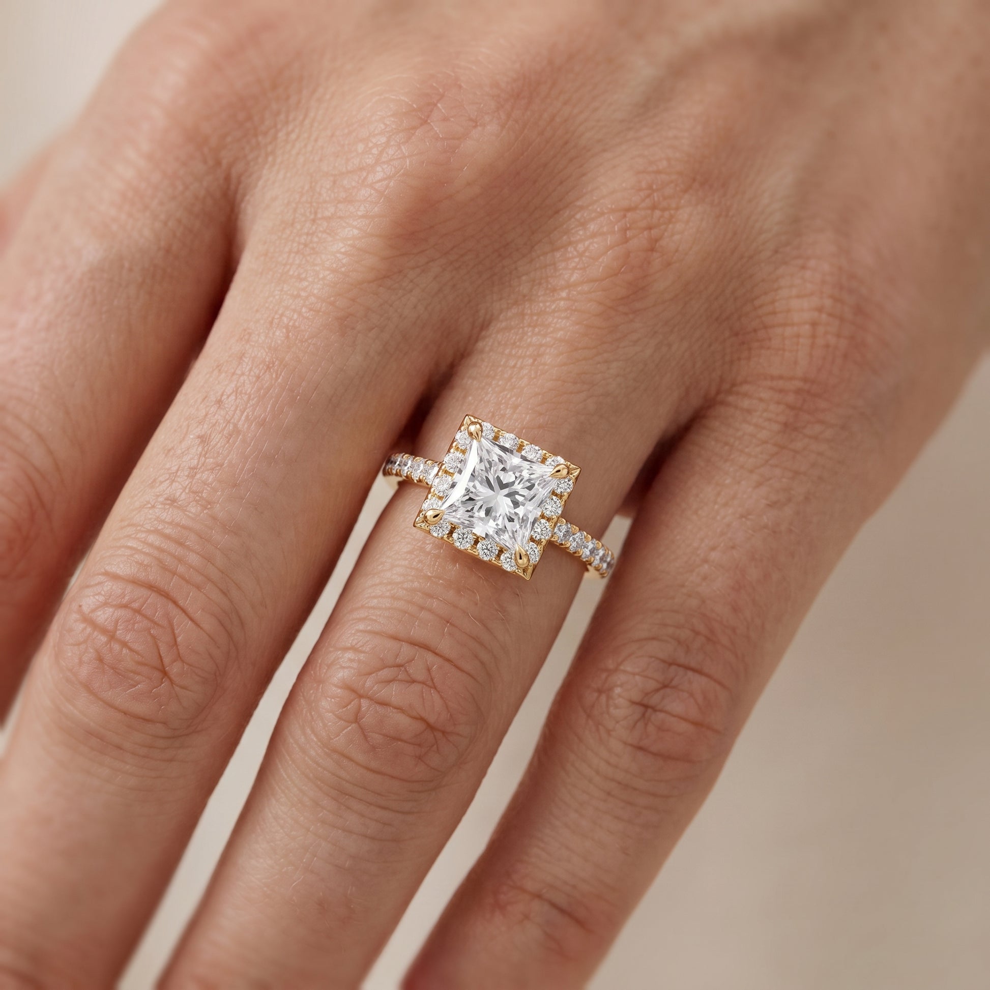 Amara Halo Claw Prong Princess Diamond Ring in Yellow Gold - lifestyle.jpg