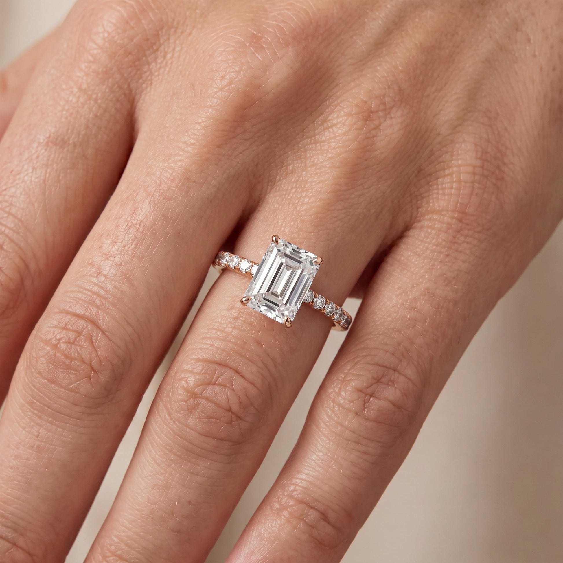 Juna French Pavé Solitaire Emerald Diamond Engagement Ring in Rose Gold - lifestyle.jpg