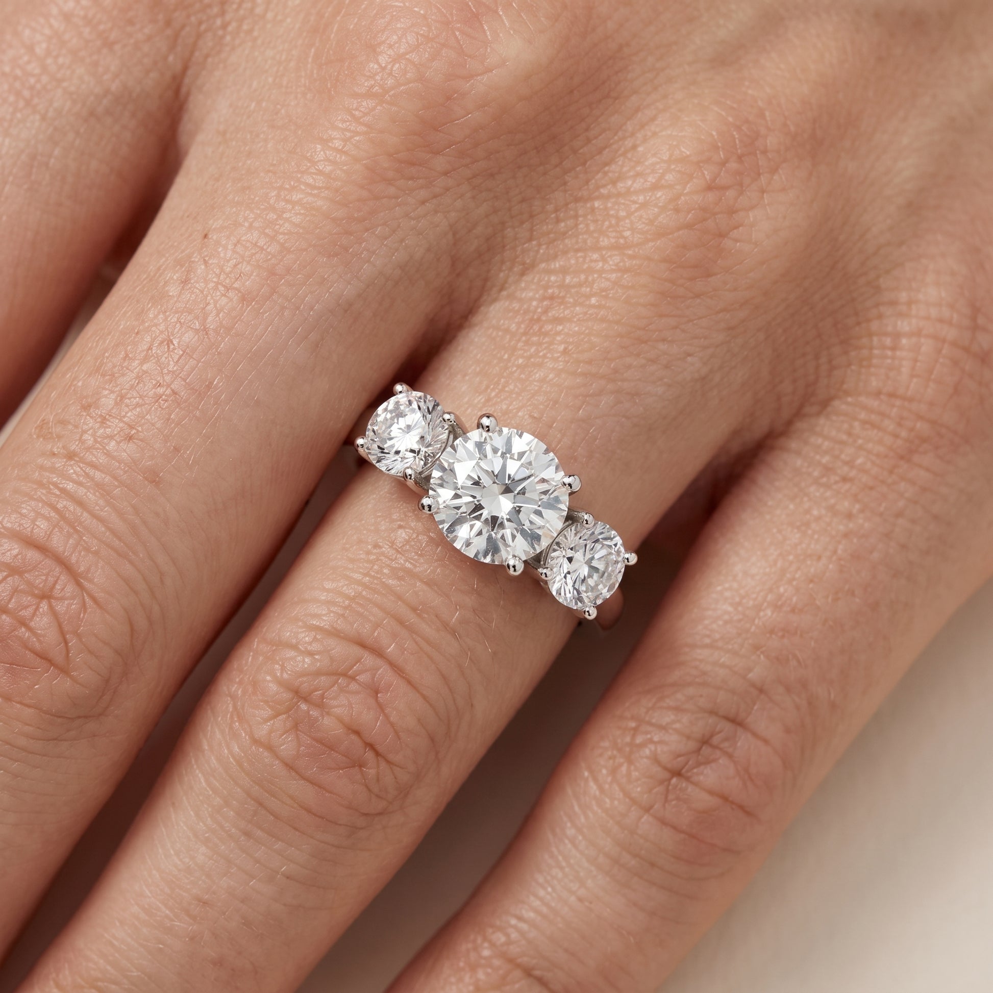 Esme Three-Stone Tapered Round Diamond Ring in Platinum - lifestyle.jpg