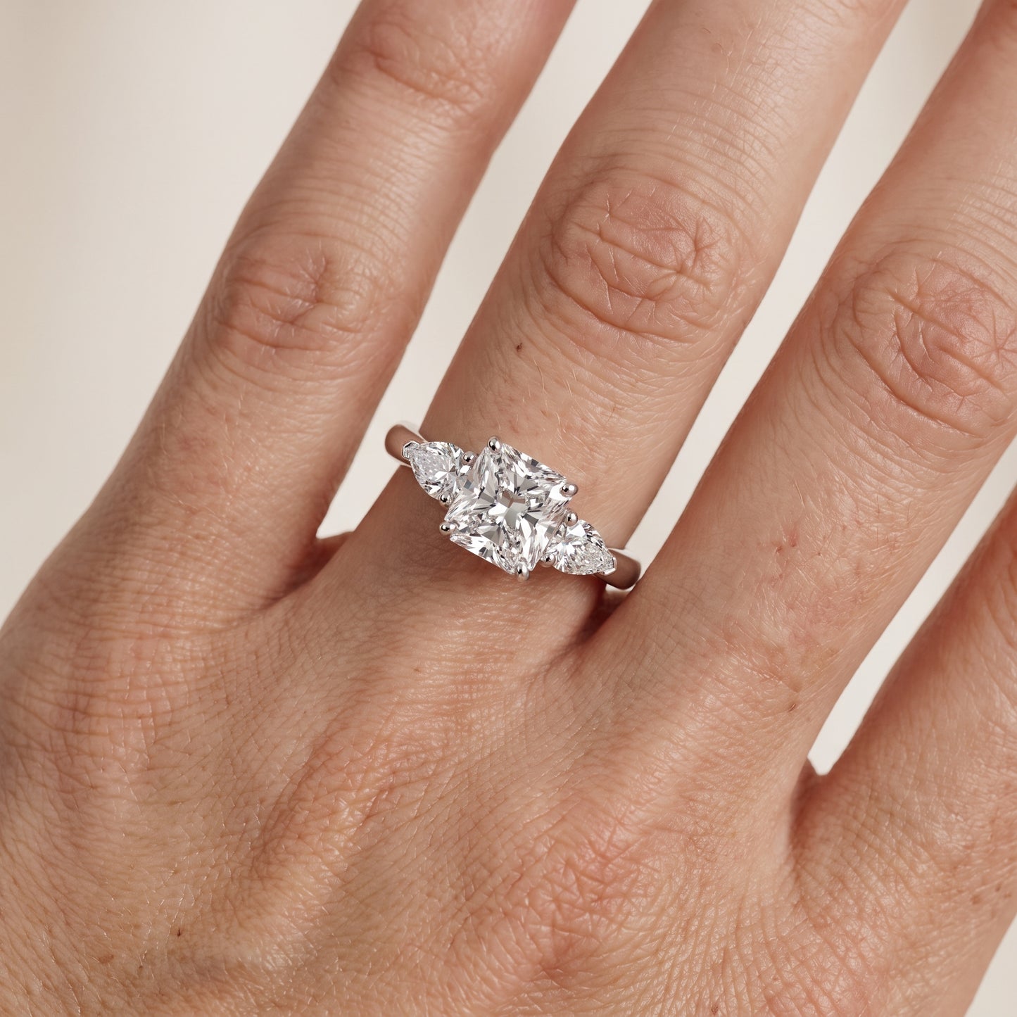 Mirabel Three-Stone Radiant Diamond Engagement Ring in Silver - lifestyle.jpg