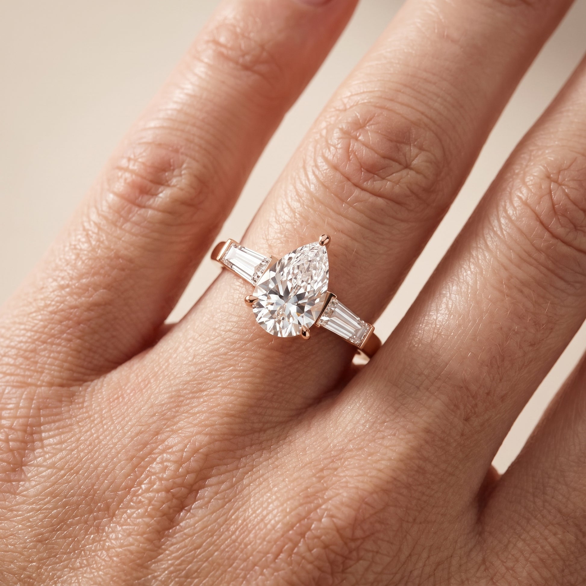 Zelda Tapered Baguette Pear Diamond Engagement Ring in Rose Gold - lifestyle.jpg