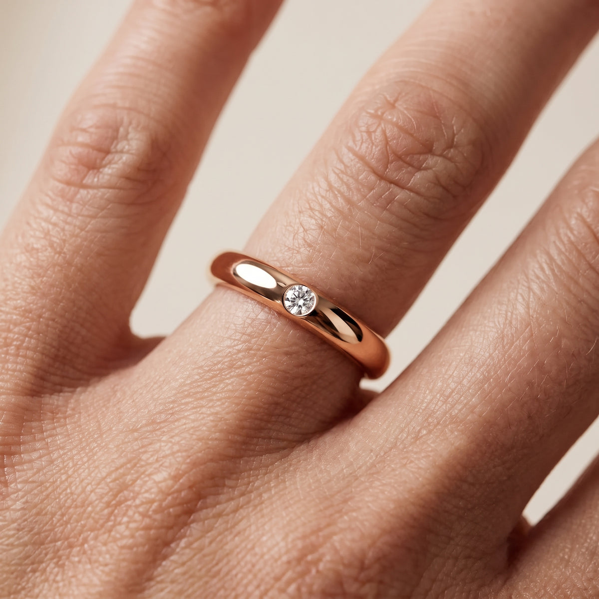 Elizabeth Comfort Fit Bezel Round Diamond Wedding Band in Rose Gold - lifestyle.jpg