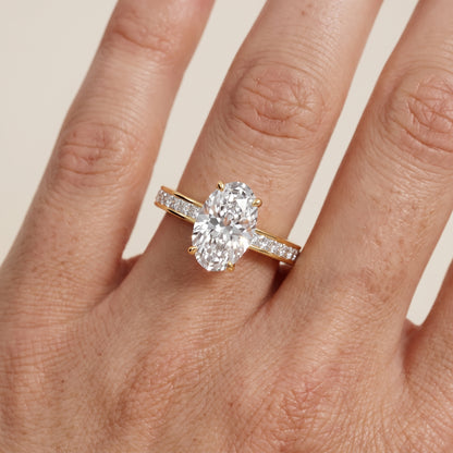 Brielle Channel Set Solitaire Oval Diamond Ring in Yellow Gold - lifestyle.jpg