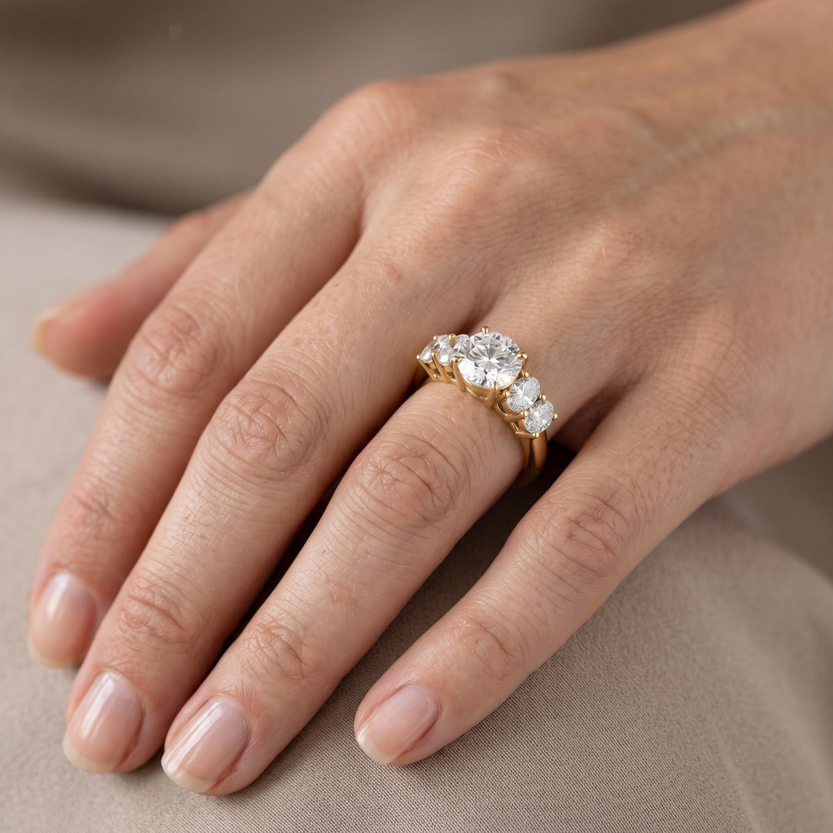 Judith Statement Five-Stone Round Diamond Engagement Ring in Platinum - lifestyle.jpg