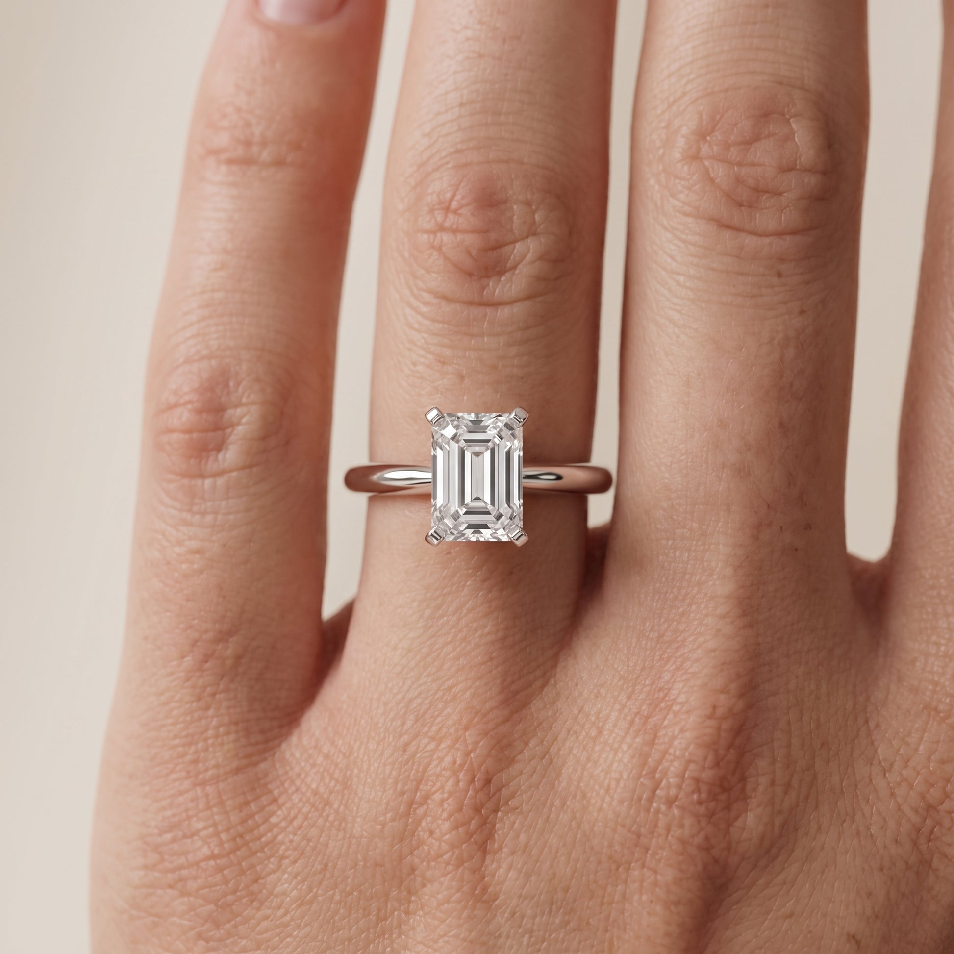 Amira Six-Prong Solitaire Emerald Diamond Engagement Ring in White Gold - lifestyle.jpg