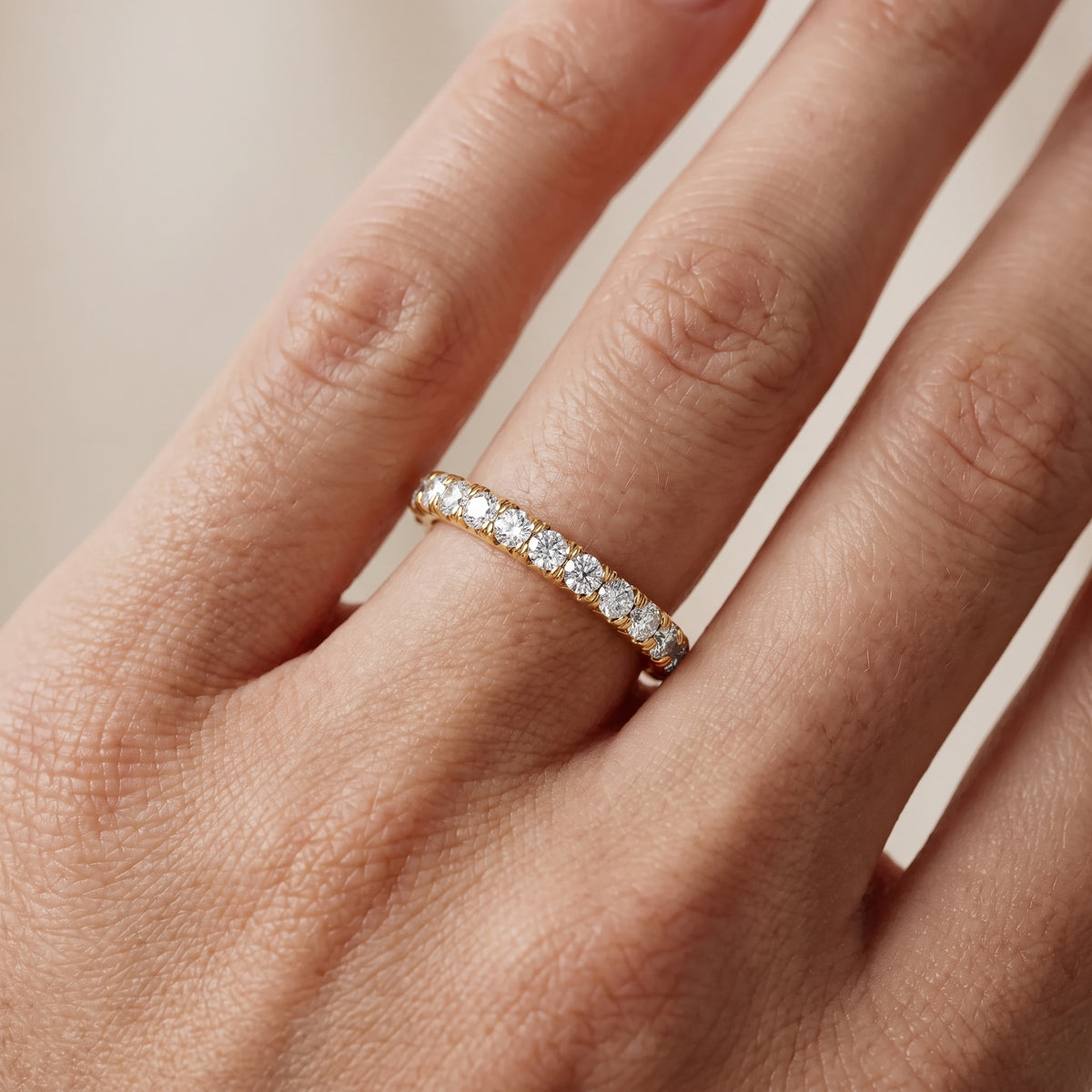 Margaret French Pavé Round Diamond Eternity Band in Yellow Gold - lifestyle.jpg