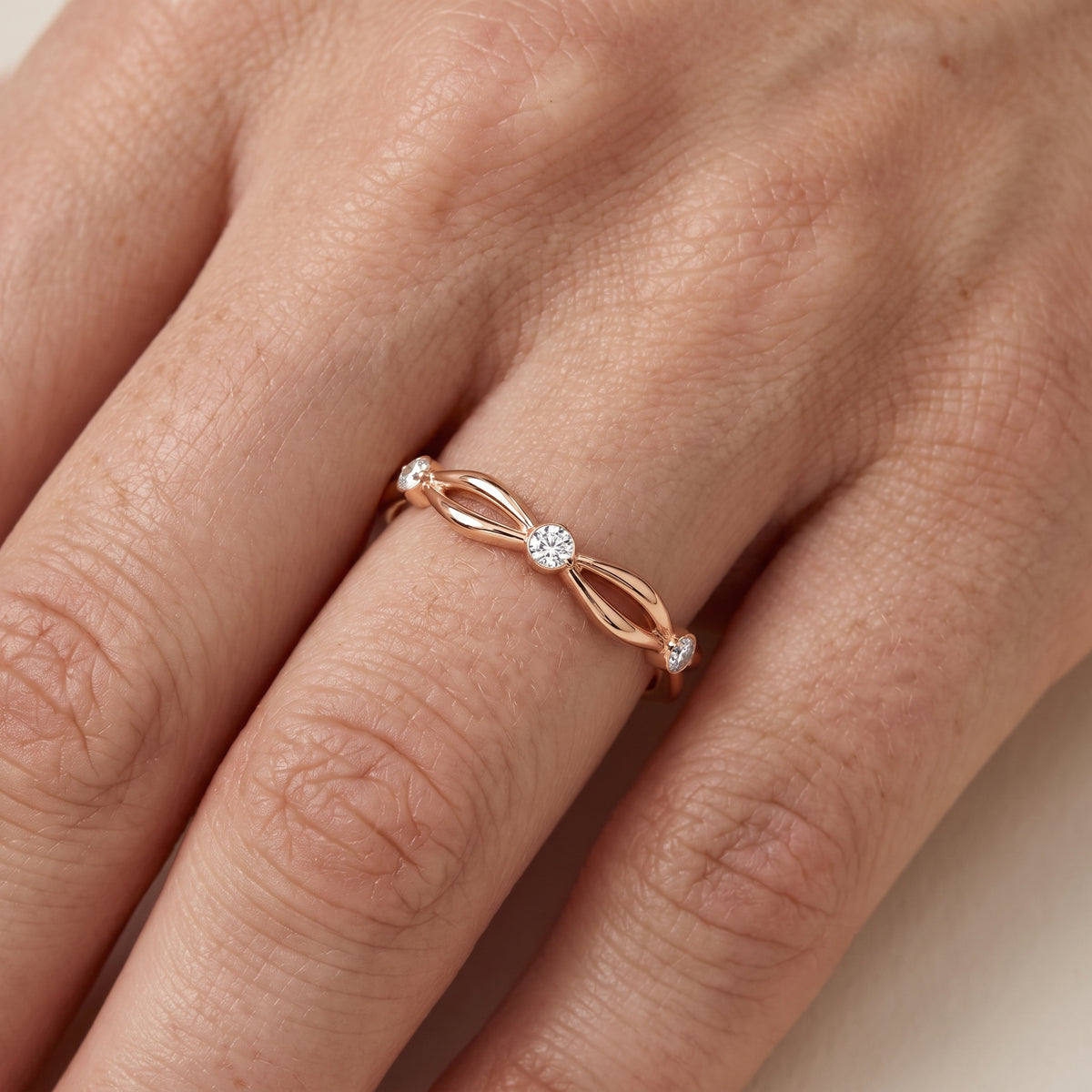 Clarissa Petite Twist Round Diamond Wedding Band in Rose Gold - lifestyle.jpg