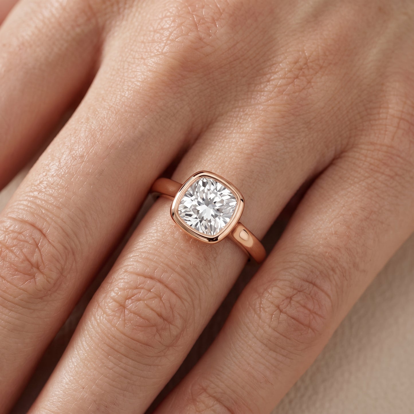 Jolie Bezel Solitaire Cushion Diamond Engagement Ring in Rose Gold - lifestyle.jpg