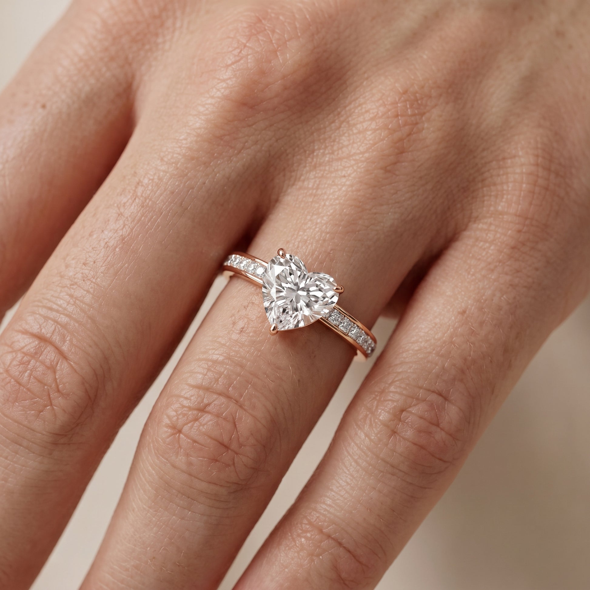 Brielle Channel Set Solitaire Heart Diamond Ring in Rose Gold - lifestyle.jpg