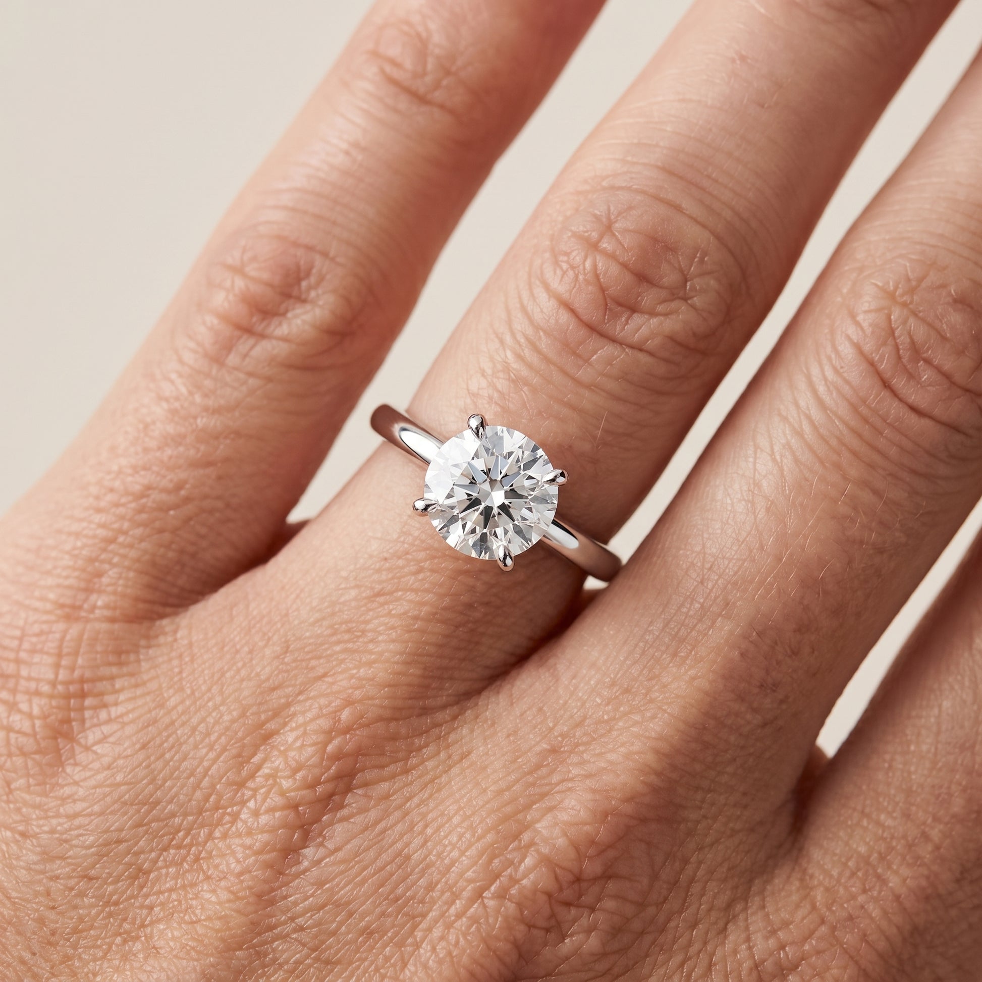 Nella Petite Solitaire Round Diamond Engagement Ring in Silver - lifestyle.jpg