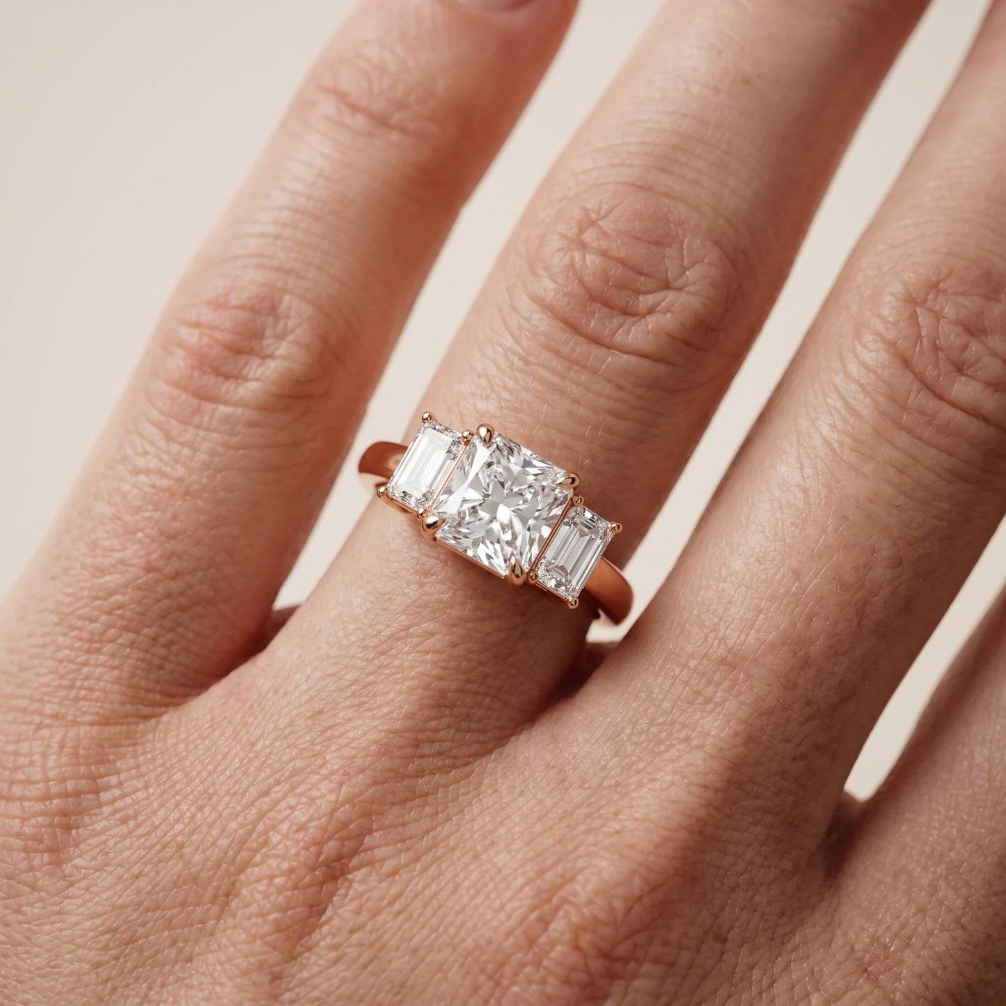 Zoe Three-Stone Radiant Diamond Ring in Rose Gold - lifestyle.jpg