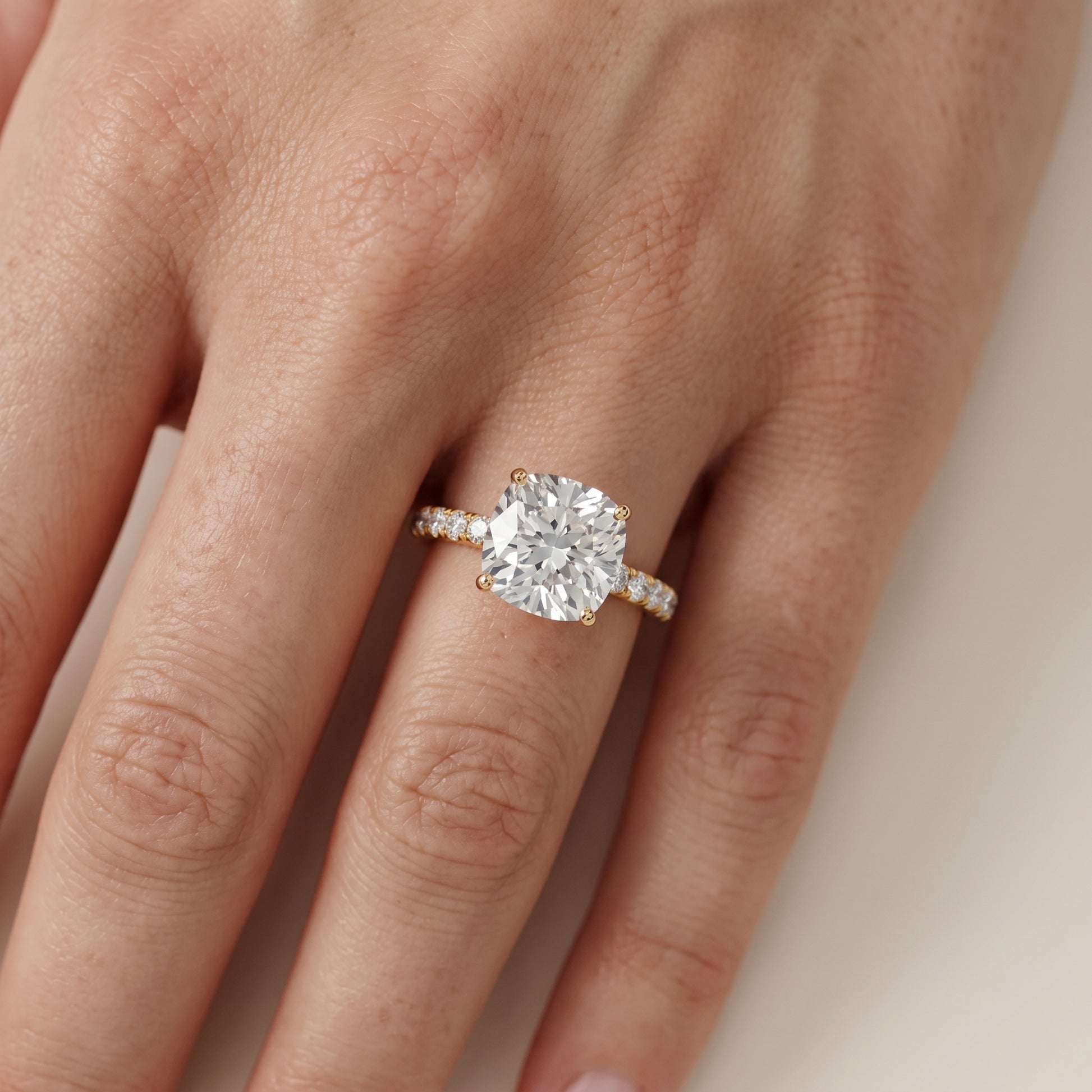 Juna French Pavé Solitaire Cushion Diamond Engagement Ring in Yellow Gold - lifestyle.jpg