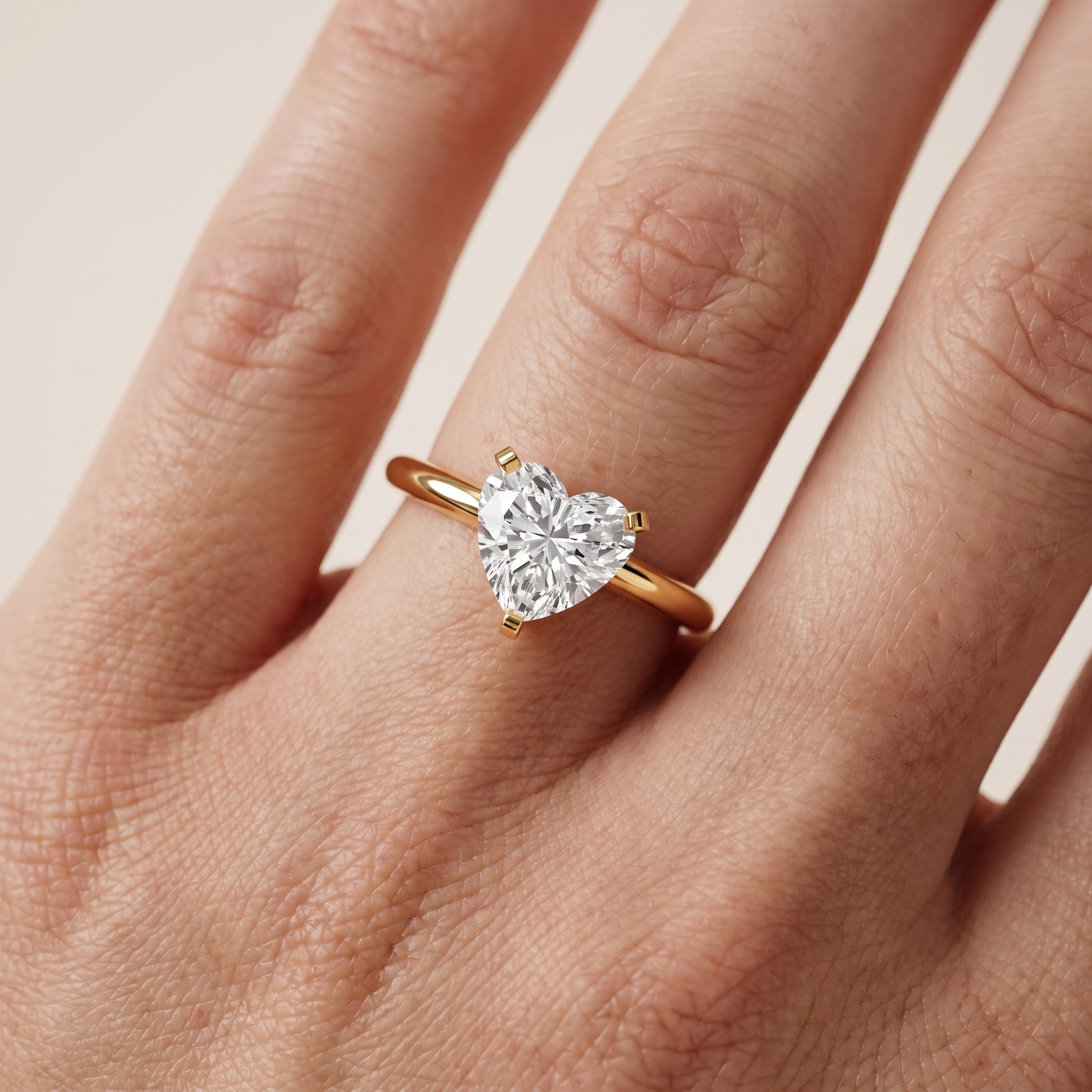 Amira Six-Prong Solitaire Heart Diamond Engagement Ring in Yellow Gold - lifestyle.jpg