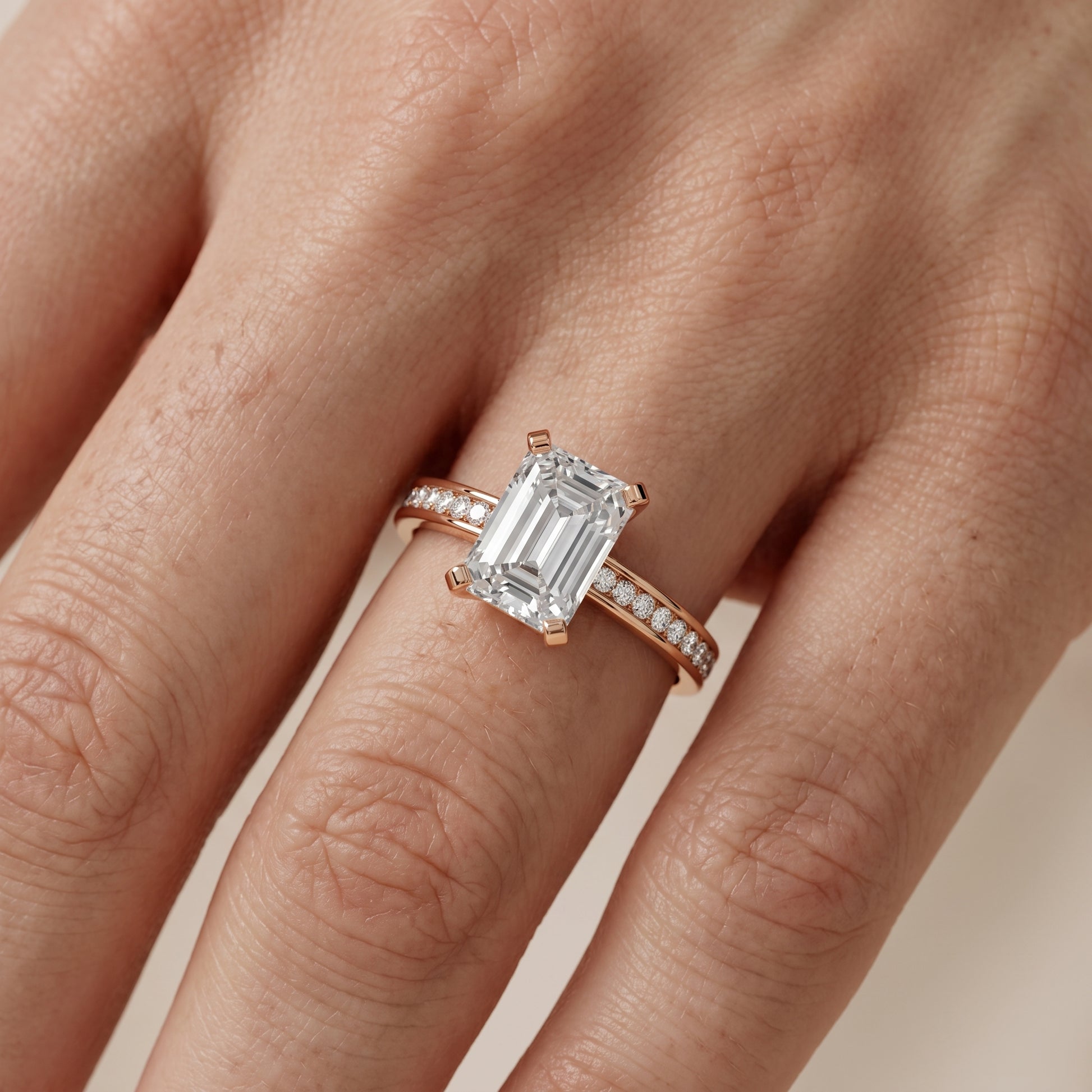 Tessa Solitaire Channel Set Emerald Diamond Engagement Ring in Rose Gold - lifestyle.jpg