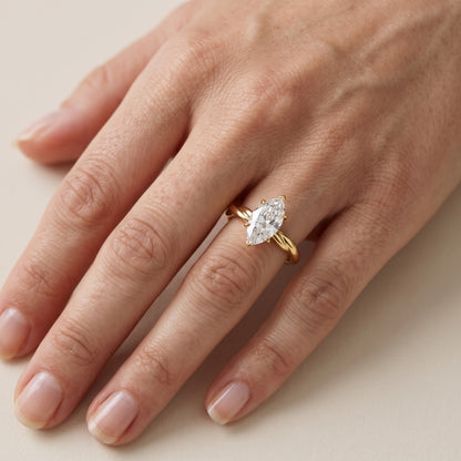 Nicola Twist Solitaire Marquise Diamond Engagement Ring in White Gold - lifestyle.jpg