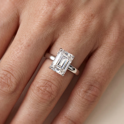 Lara Hidden Halo Emerald Diamond Engagement Ring in Platinum - lifestyle.jpg