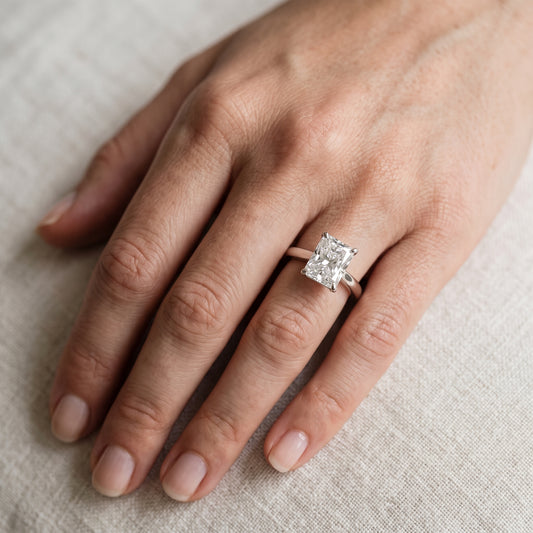 Kalia Knife Edge Solitaire Radiant Diamond Engagement Ring in Platinum - lifestyle.jpg
