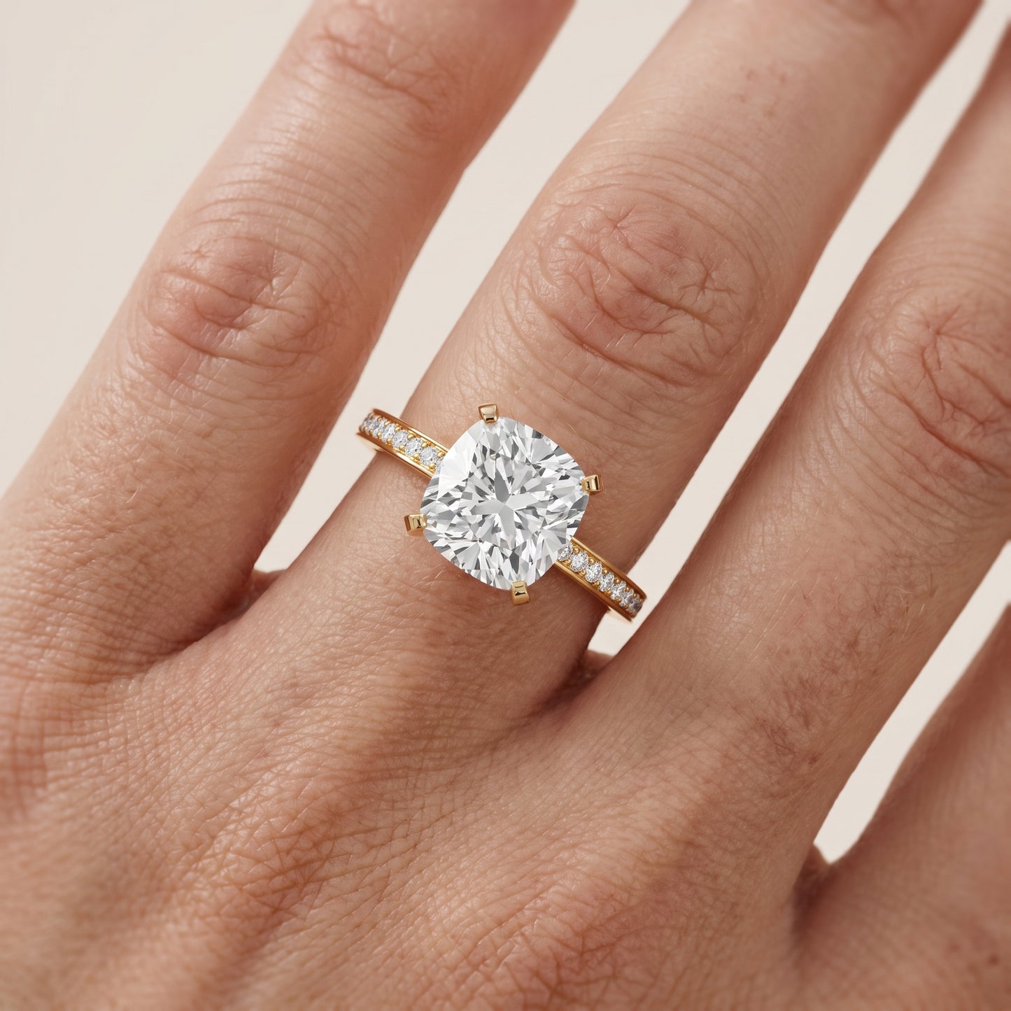 Naia Hidden Halo Cushion Diamond Ring in Yellow Gold - lifestyle.jpg
