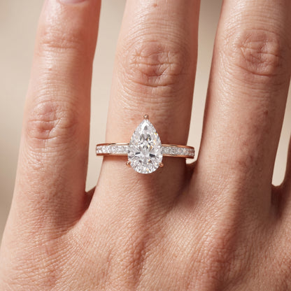 Brielle Channel Set Solitaire Pear Diamond Ring in Rose Gold - lifestyle.jpg