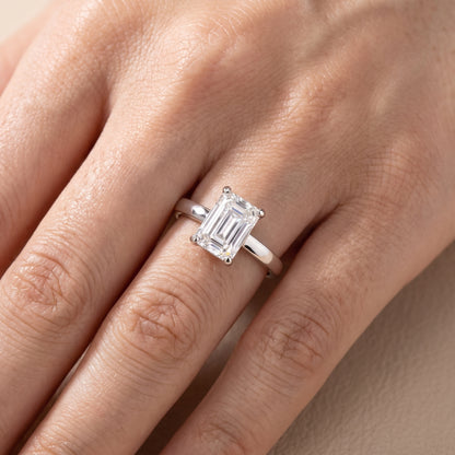 Delia Solitaire Emerald Diamond Engagement Ring in Platinum - lifestyle.jpg