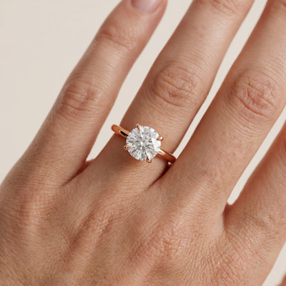 Nella Petite Solitaire Round Diamond Engagement Ring in Rose Gold - lifestyle.jpg