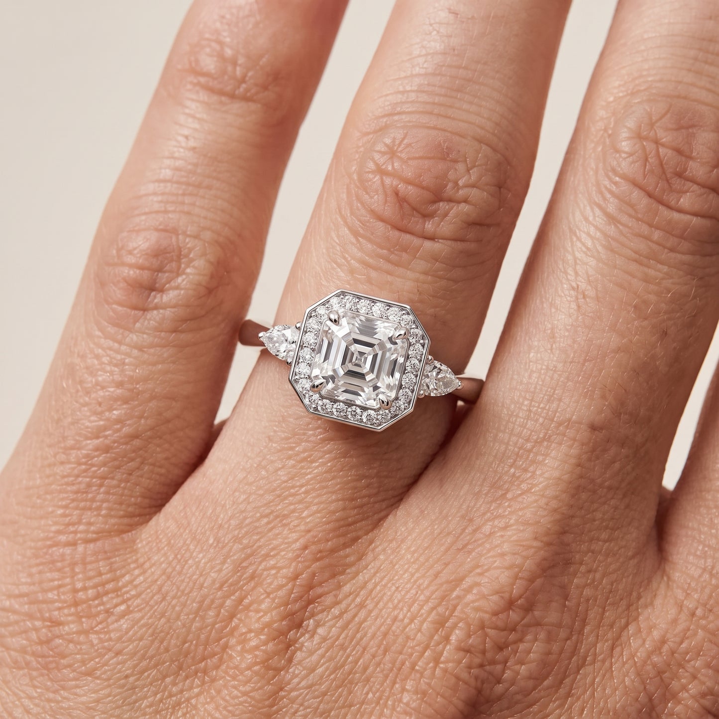 Eliza Halo Sidestone Asscher Diamond Engagement Ring in Platinum - lifestyle.jpg