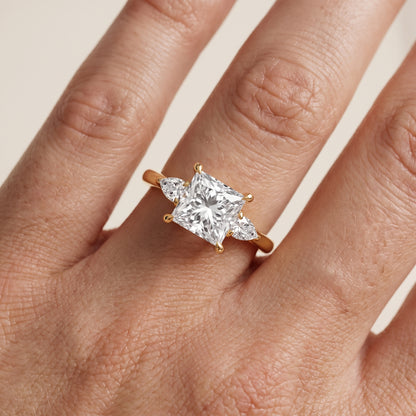 Leila Three-Stone Princess Diamond Engagement Ring in Yellow Gold - lifestyle.jpg