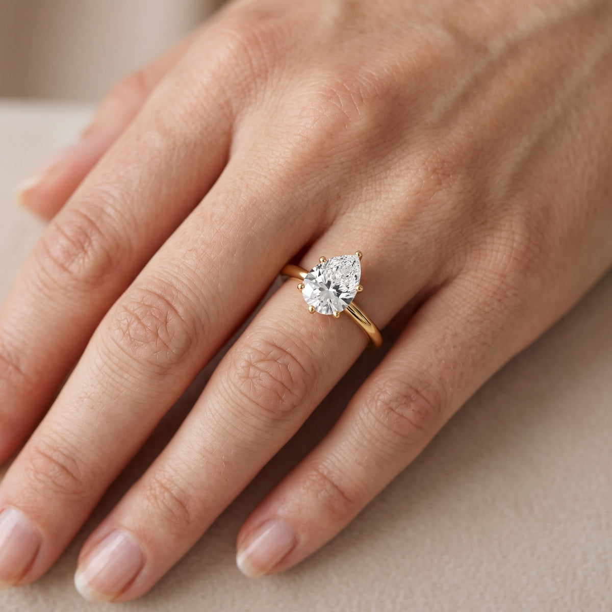Giulia Solitaire Pear Diamond Engagement Ring in White Gold - lifestyle.jpg