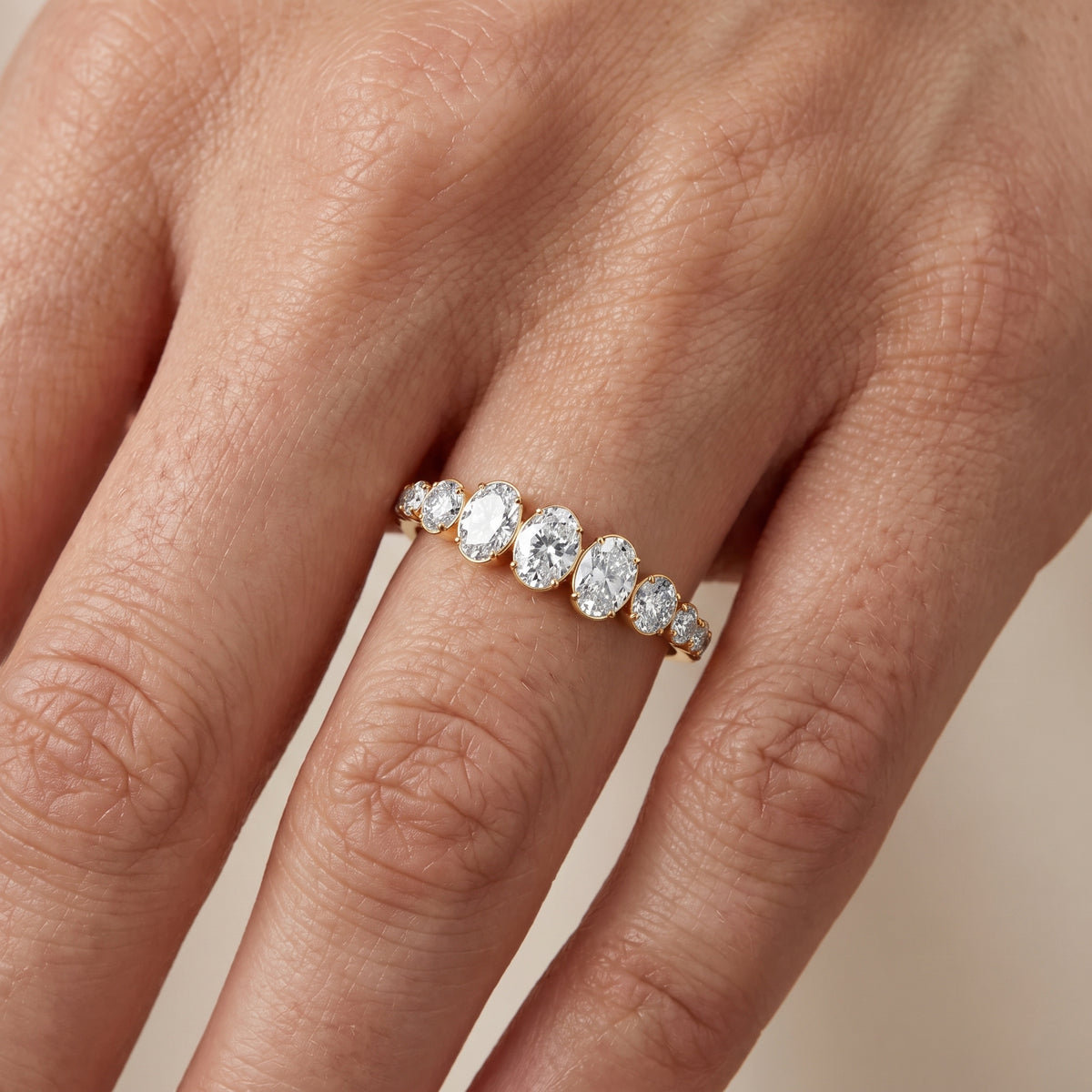 Nerea Riviera Oval & Round Diamond Wedding Band in Yellow Gold - lifestyle.jpg