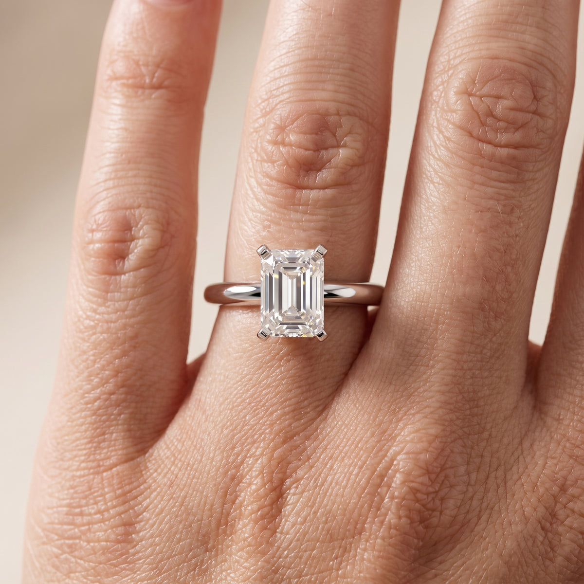 Arabella Six-Prong Solitaire Emerald Diamond Engagement Ring in White Gold - lifestyle.jpg
