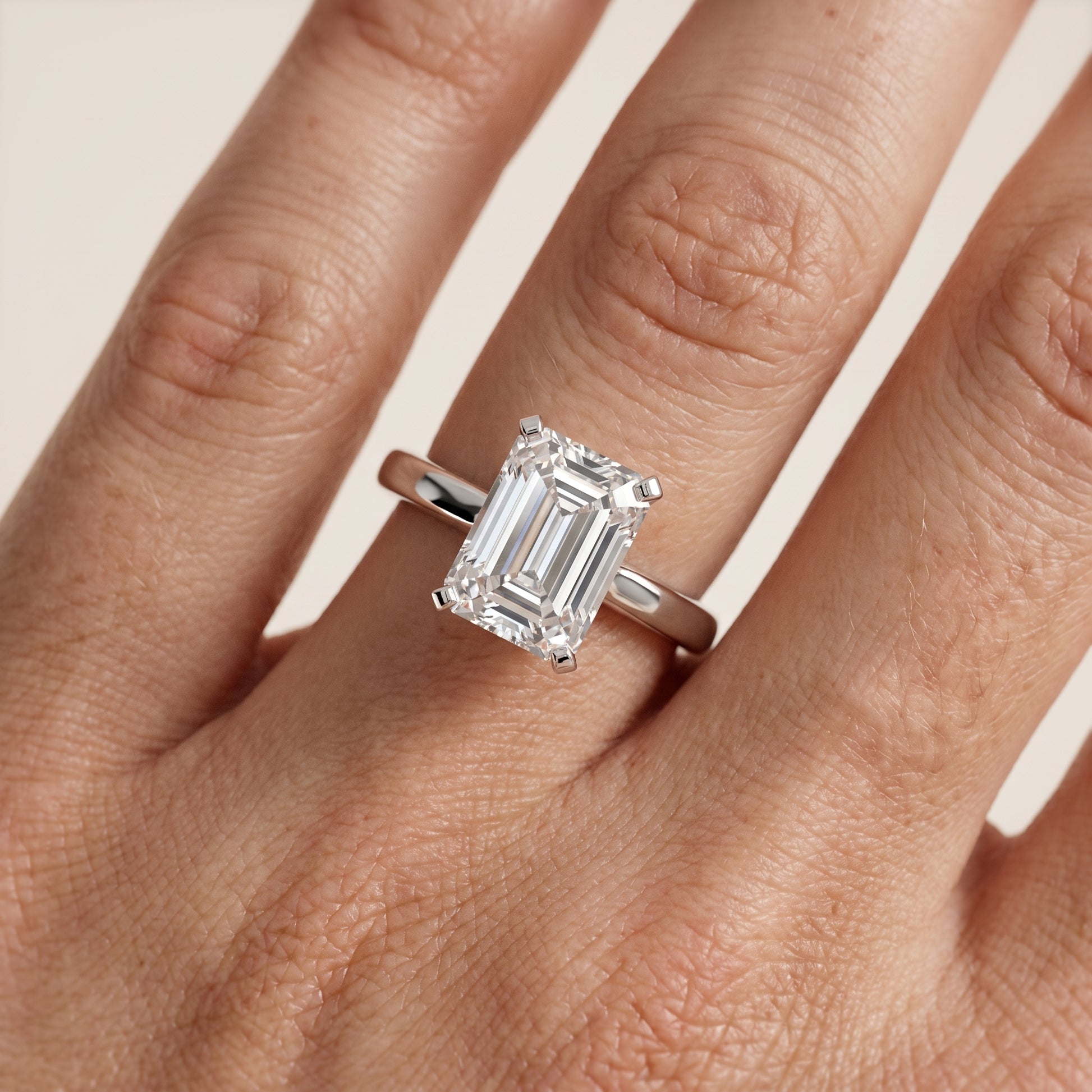 Liana Solitaire Claw Prong Emerald Diamond Engagement Ring in Silver - lifestyle.jpg