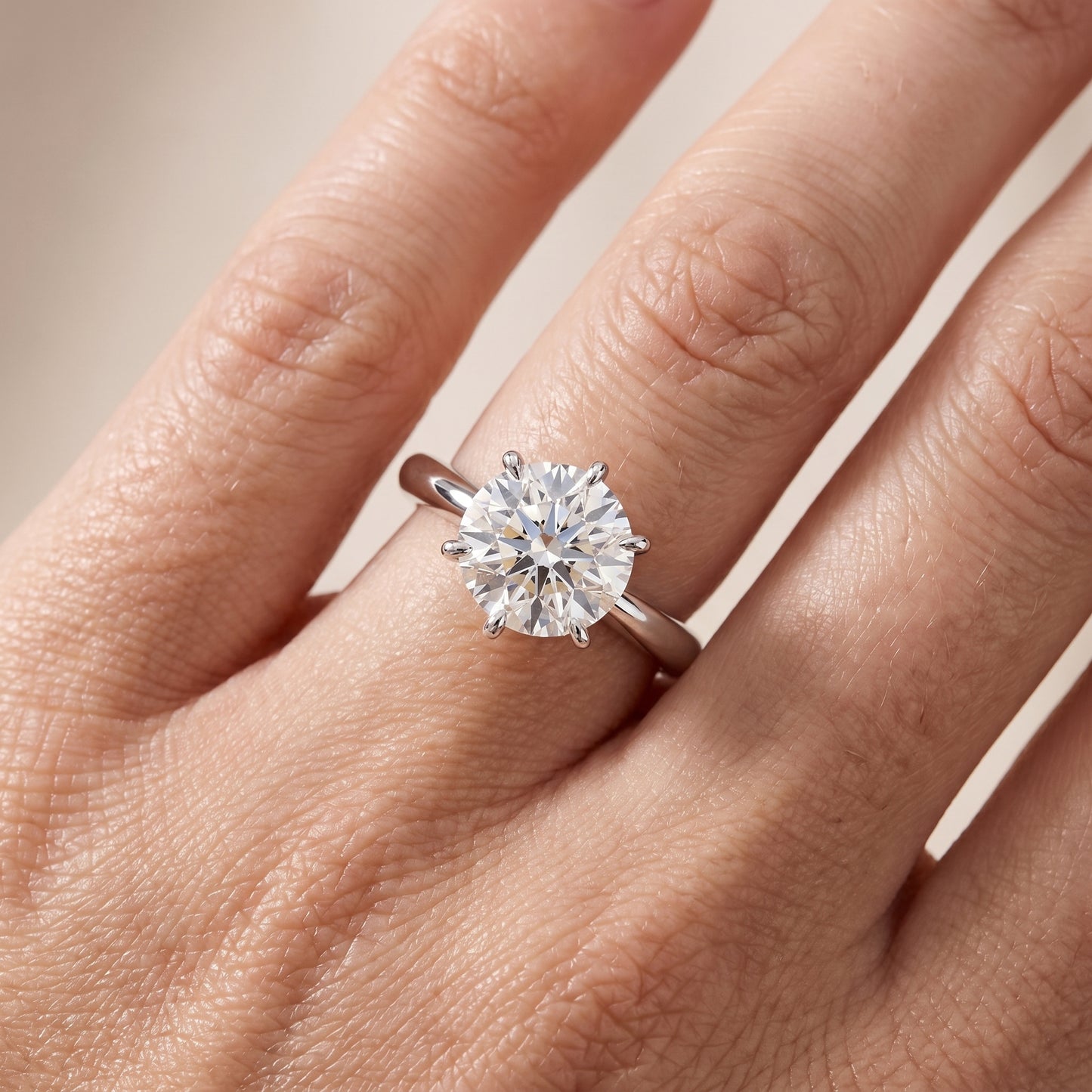 Evie Solitaire Six-Prong Round Diamond Engagement Ring in Platinum - lifestyle.jpg