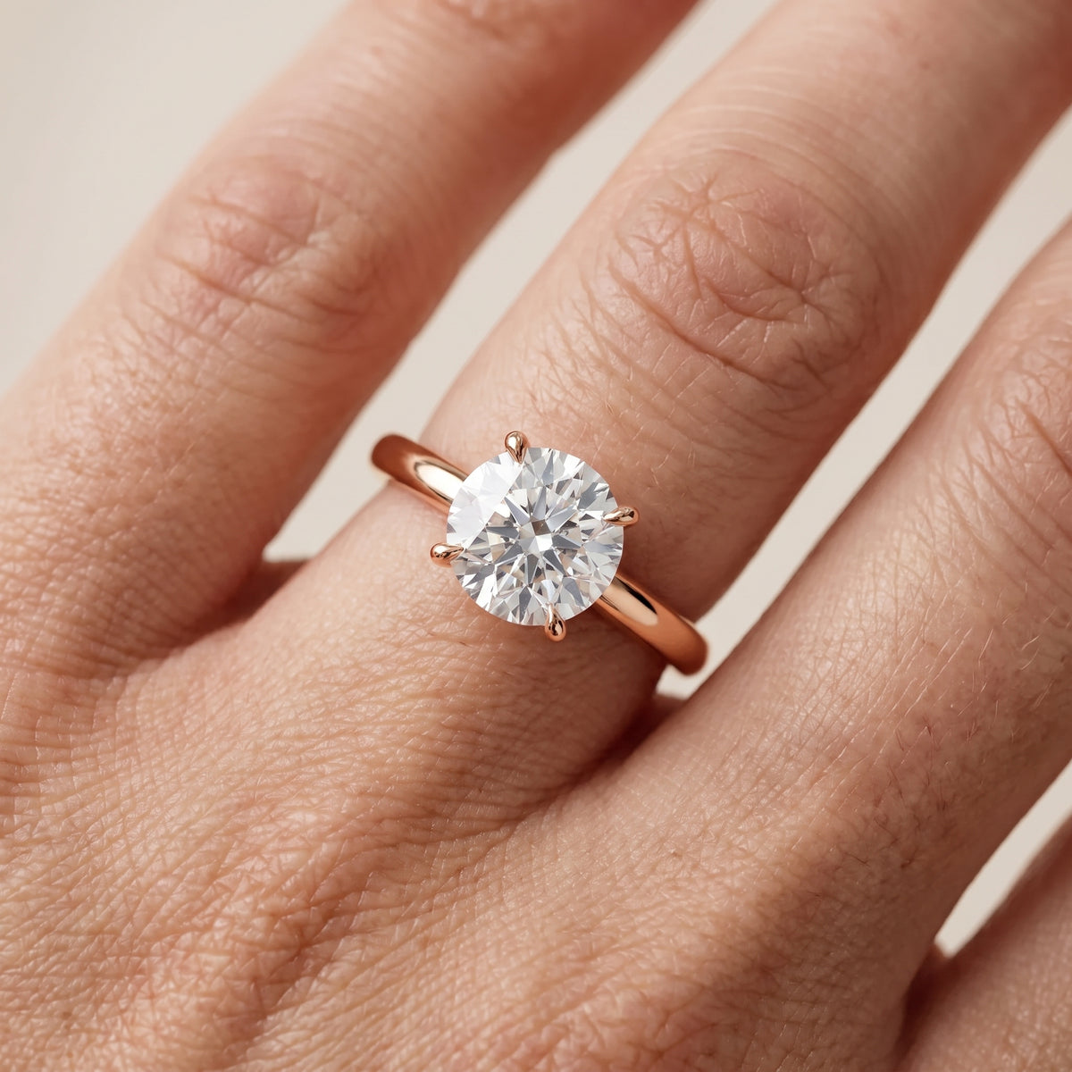 Lyla Petite Solitaire Round Diamond Engagement Ring in Rose Gold - lifestyle.jpg