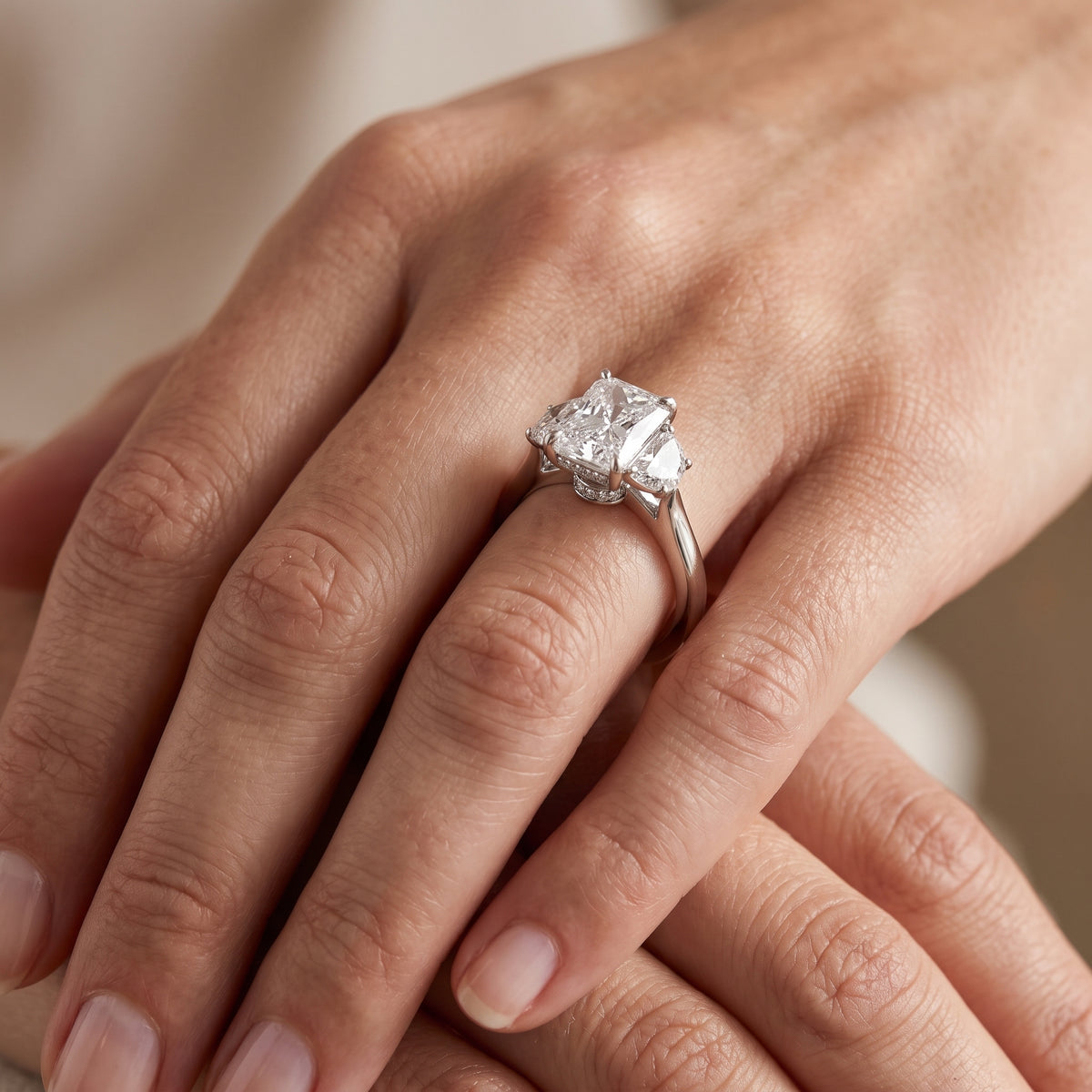 Romy Three-Stone Radiant Diamond Engagement Ring in White Gold - lifestyle.jpg