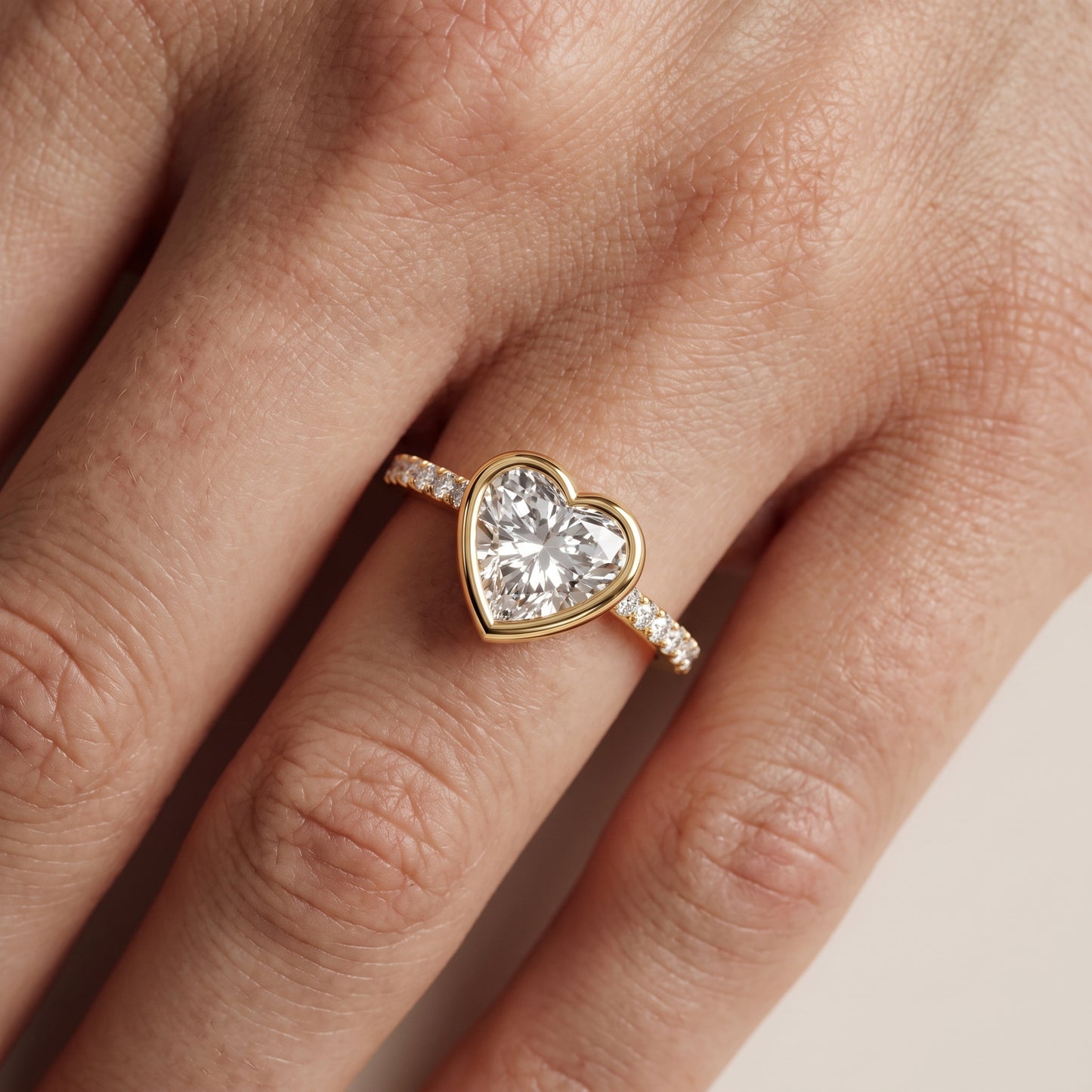 Cora Bezel Pavé Heart Diamond Ring in Yellow Gold - lifestyle.jpg